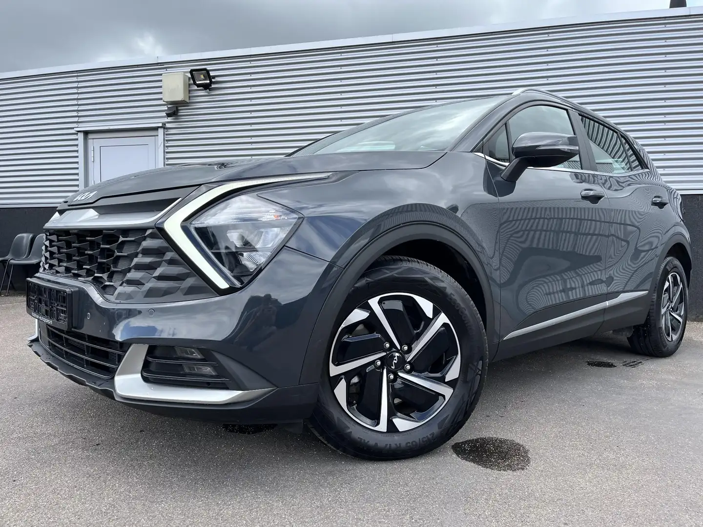 Kia Sportage 1.6 T-GDi Hybrid DynamicLine edition Navigatie, Pa Grau - 2