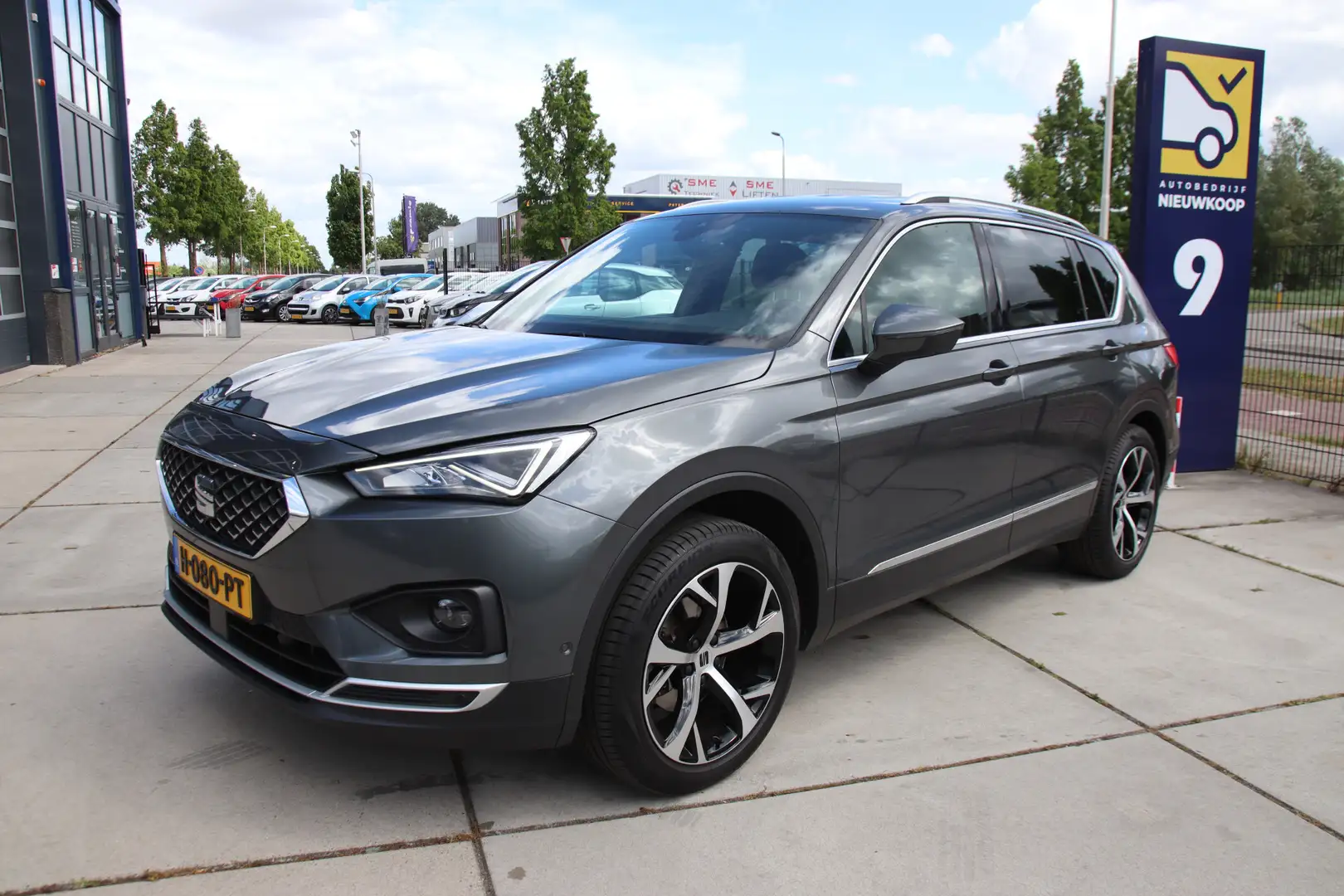 SEAT Tarraco 1.5 TSI Xcellence Upgrade Professional-WInter, NL Grijs - 1
