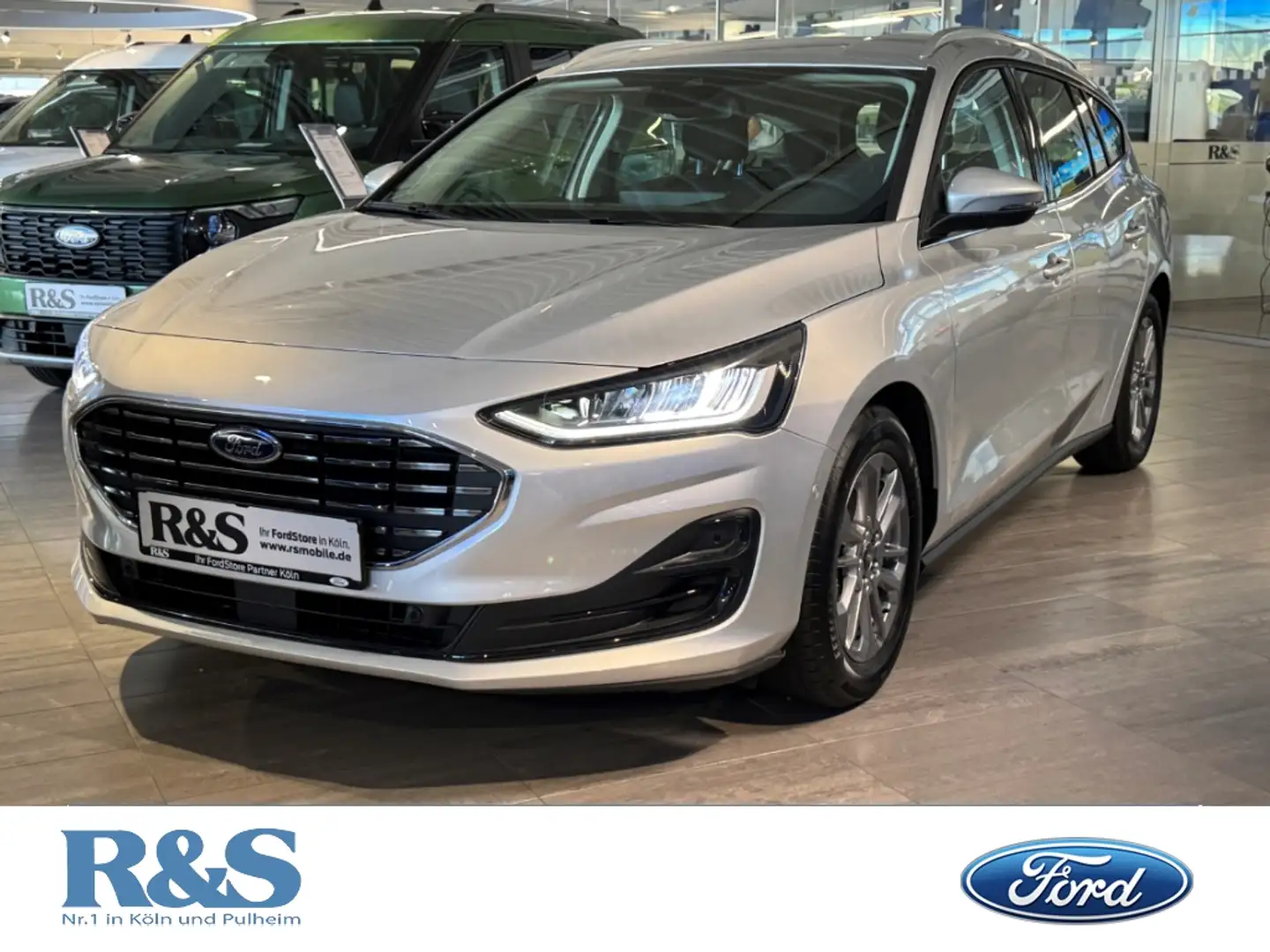 Ford Focus Titanium Turnier Automatik+Rückfahrkamera+Navi+Tem Silber - 1