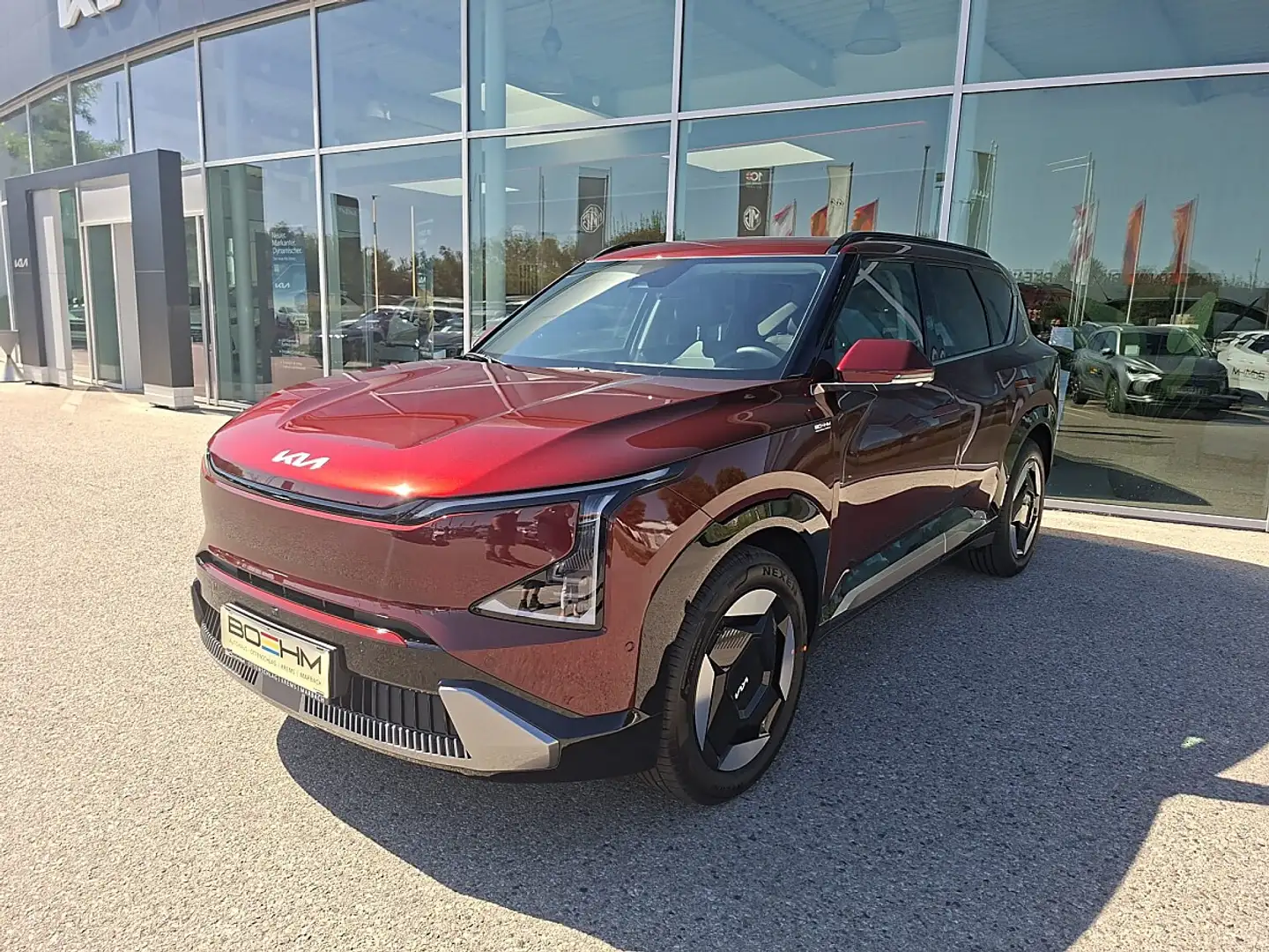Kia EV5 265 AWD 81,4kWh Earth Plus Magma Rot Rot - 1