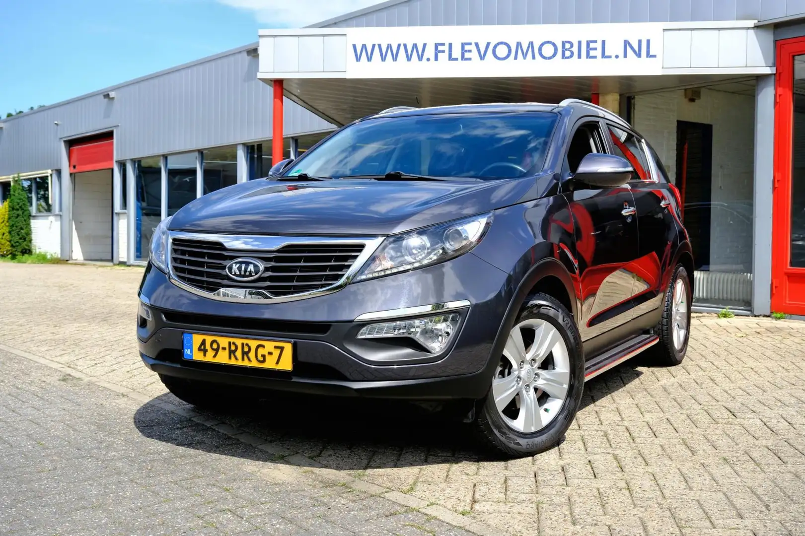 Kia Sportage 2.0 163pk X-ecutive Plus Pack Aut. Clima|1e Eig|LM Grijs - 1