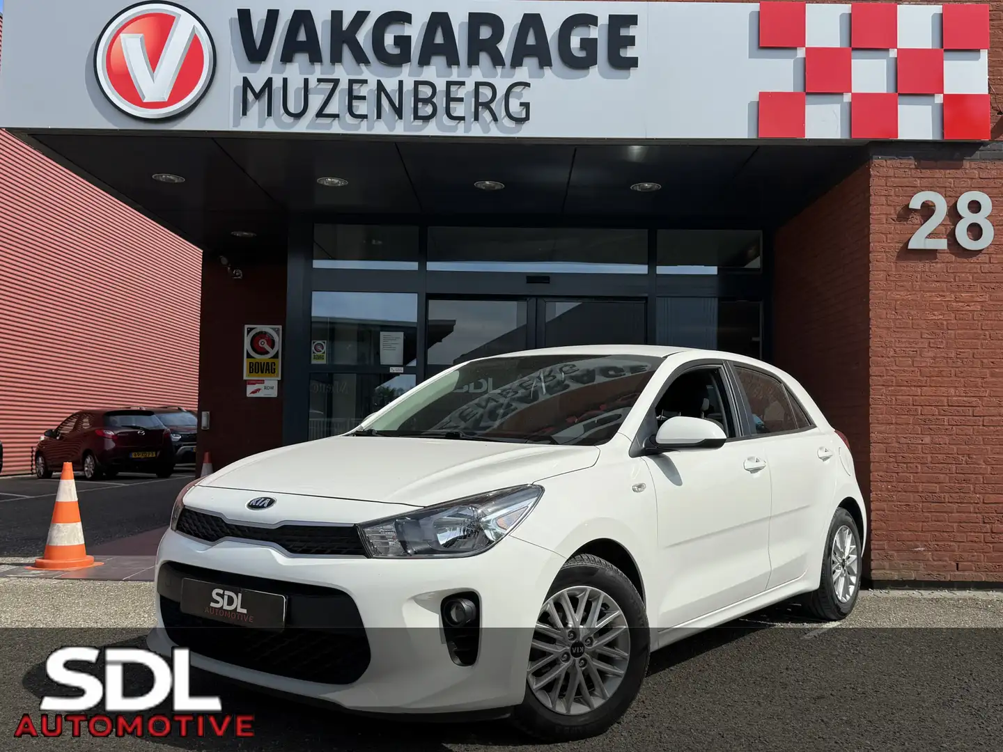 Kia Rio 1.2 CVVT DynamicLine // NAVI // AIRCO // CAMERA // Blanc - 1