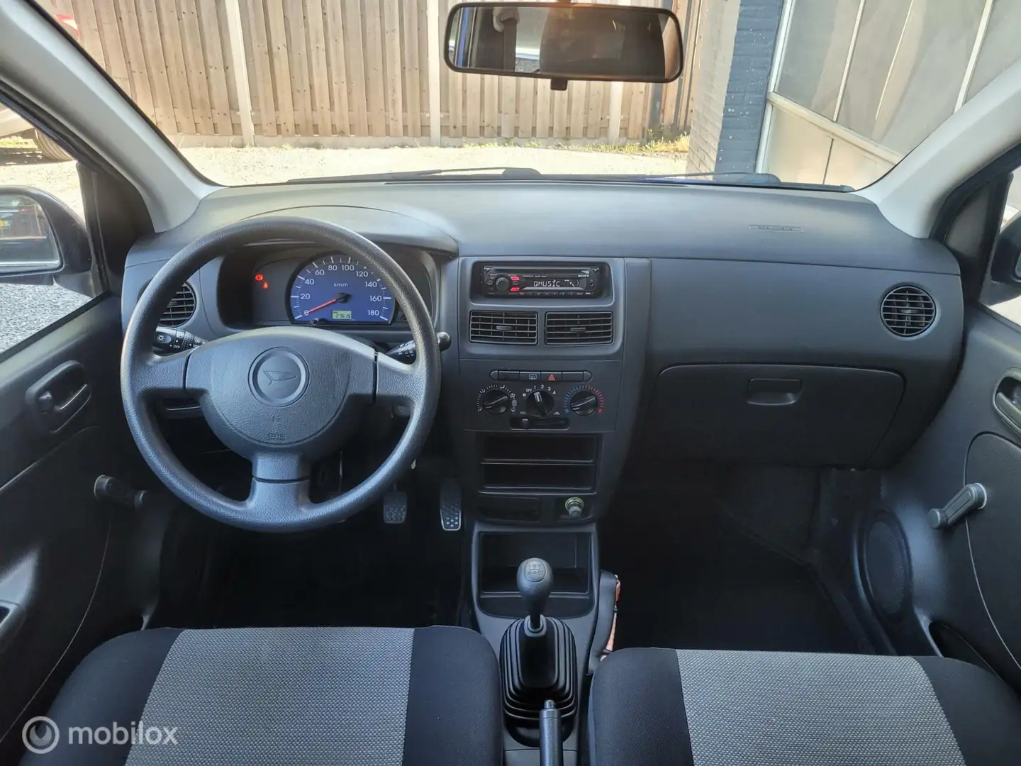 Daihatsu Cuore 1.0-12V 100th Anniversary | DOH | 27.000KM | Blauw - 2