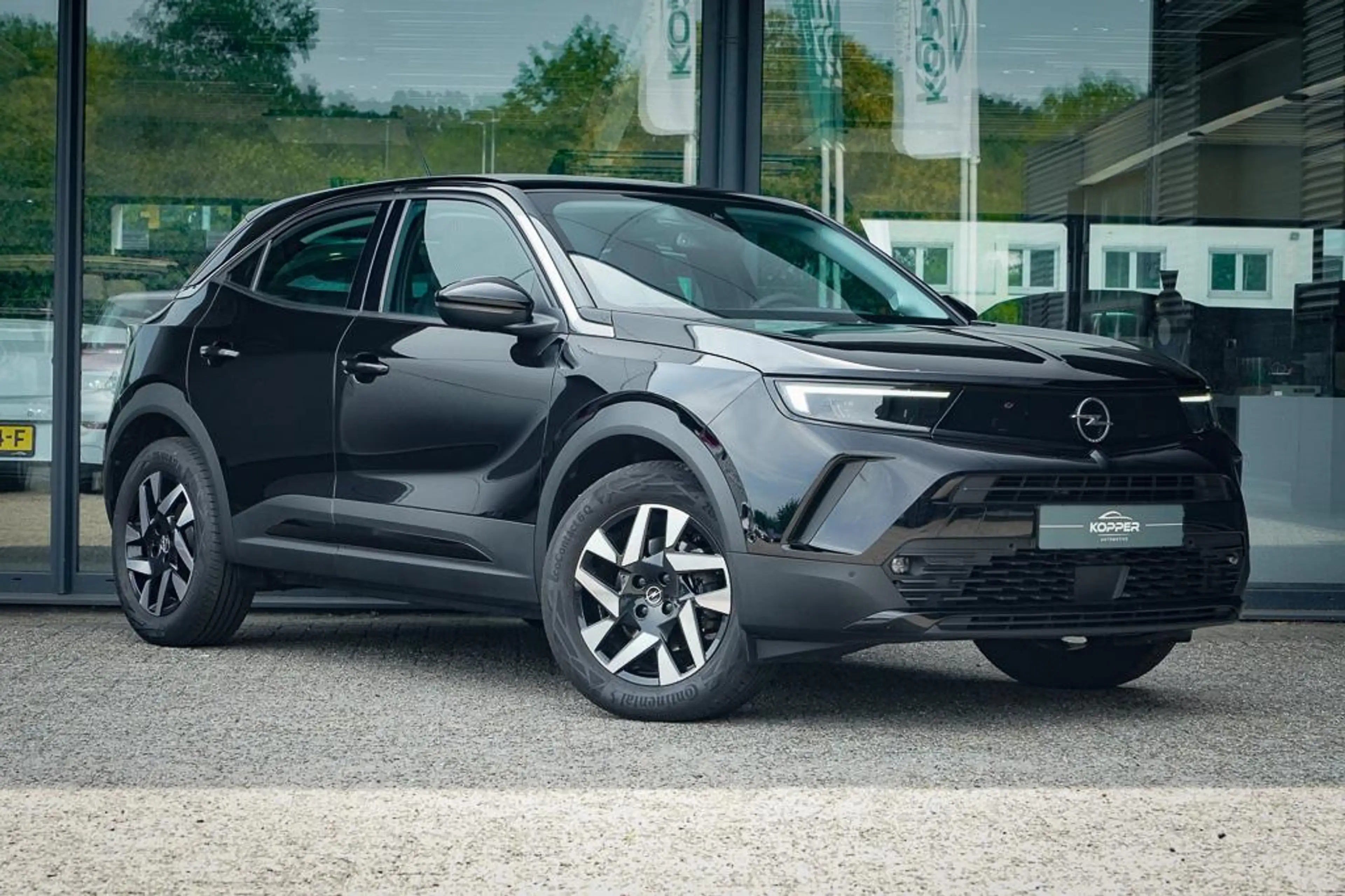 Opel Mokka-E Edition 50 kWh / Warmtepomp / Zwart Metallic / 1 E — photo 12