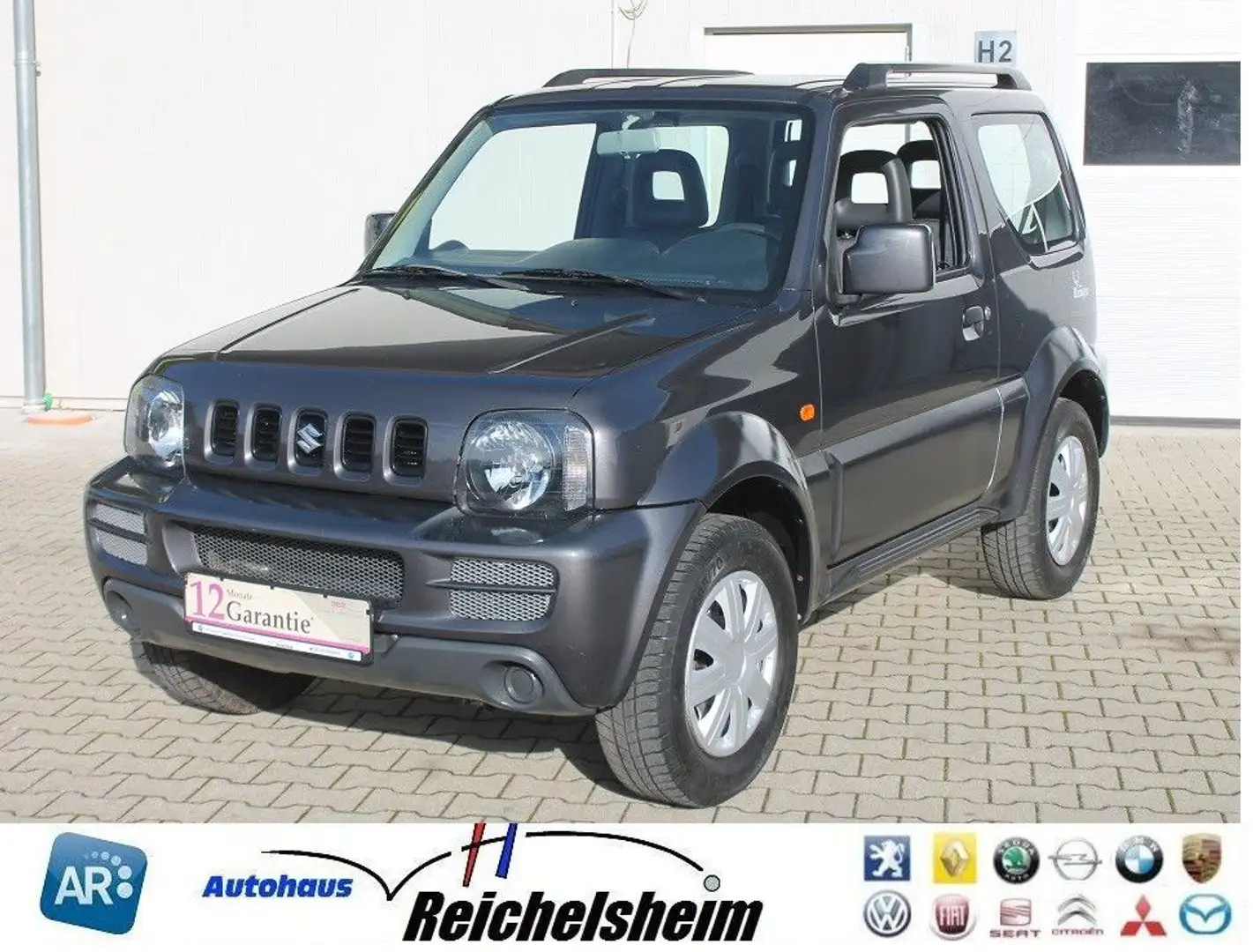 Suzuki Jimny Ranger,wenig Km,AHK,4x4,gepflegt,Finanz Gris - 1