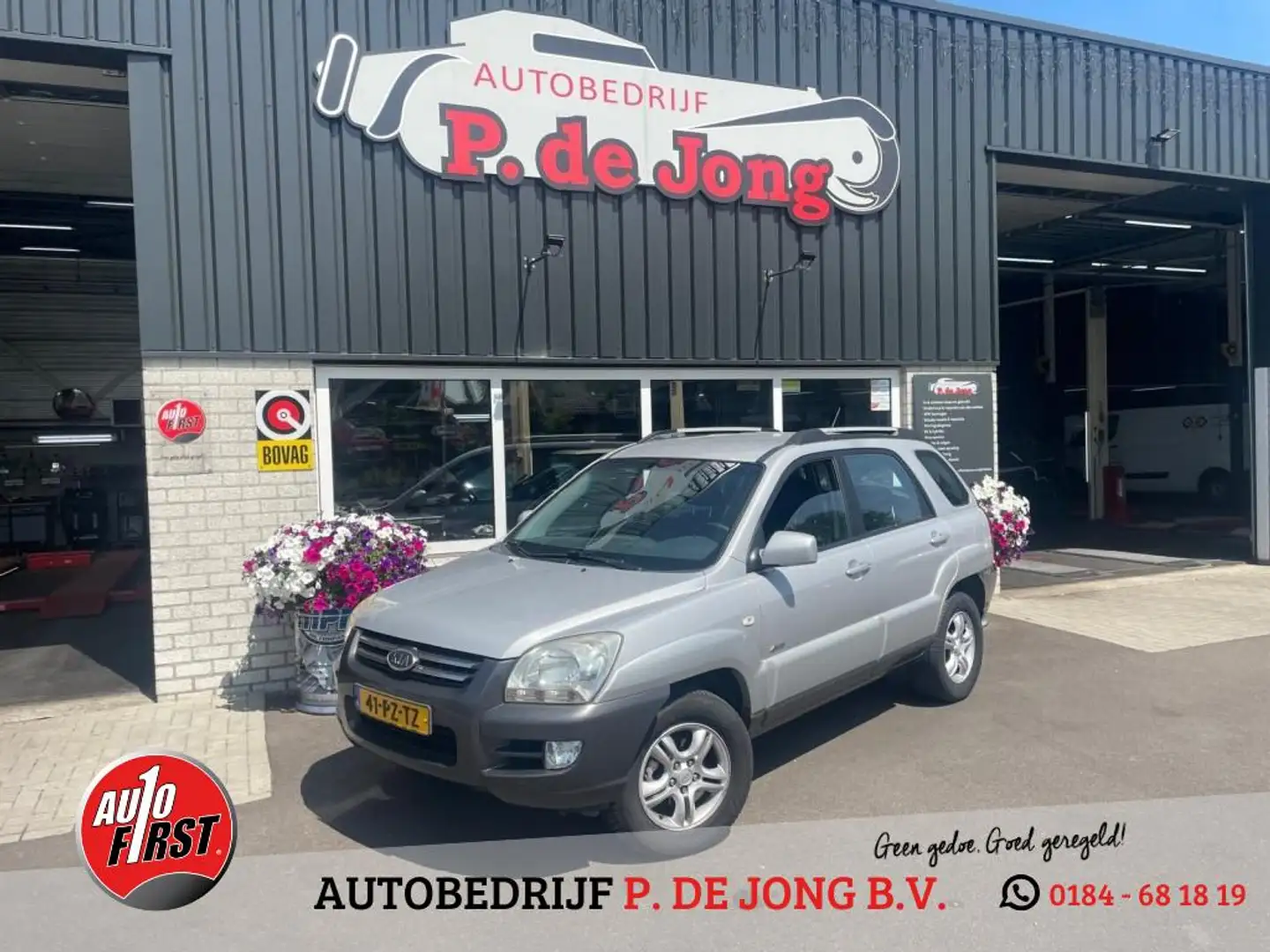 Kia Sportage 2.0 CVVT ADVENT. 4WD Trekhaak Clima Cruise Navi Grijs - 1