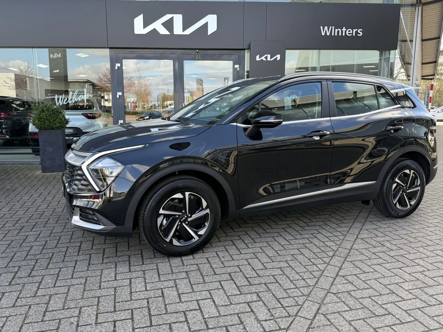 Kia Sportage 1.6 T-GDI Hybrid DynamicLine Nieuw uit voorraad le Zwart - 1