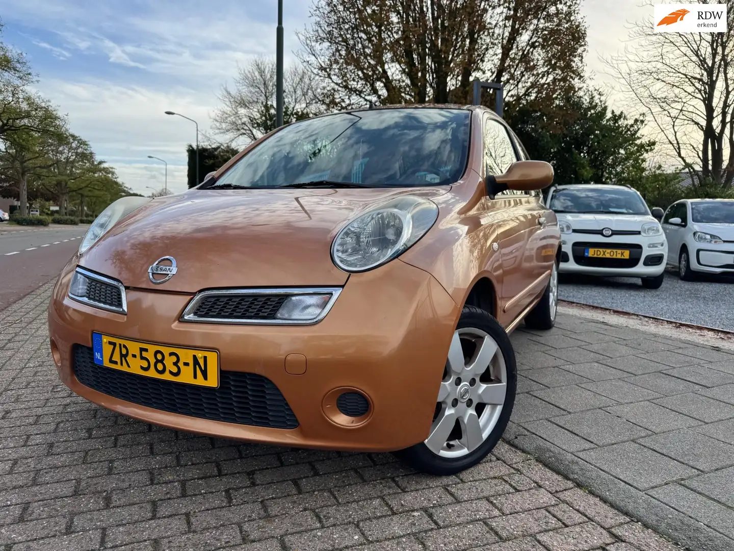 Nissan Micra 1.2 Mix A-C Elek Pakket Navi Lmv Apk 04-26 Oranje - 1