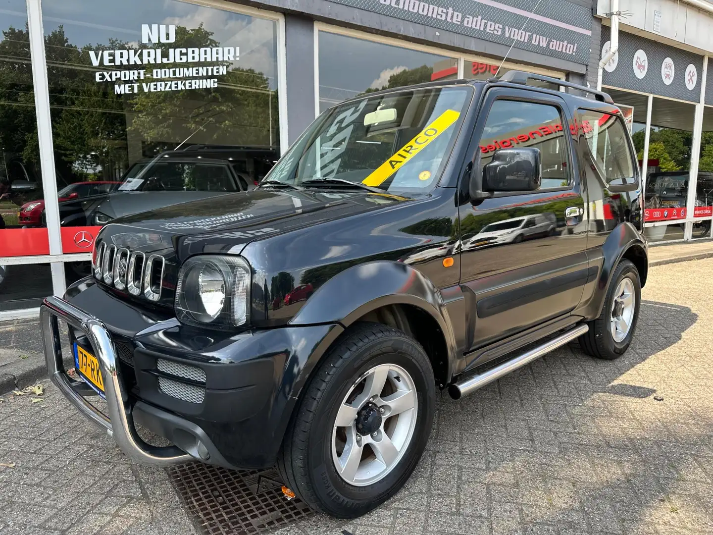 Suzuki Jimny 1.3 Exclusive 1ste EIGENAAR AIRCO 4X4 Zwart - 2