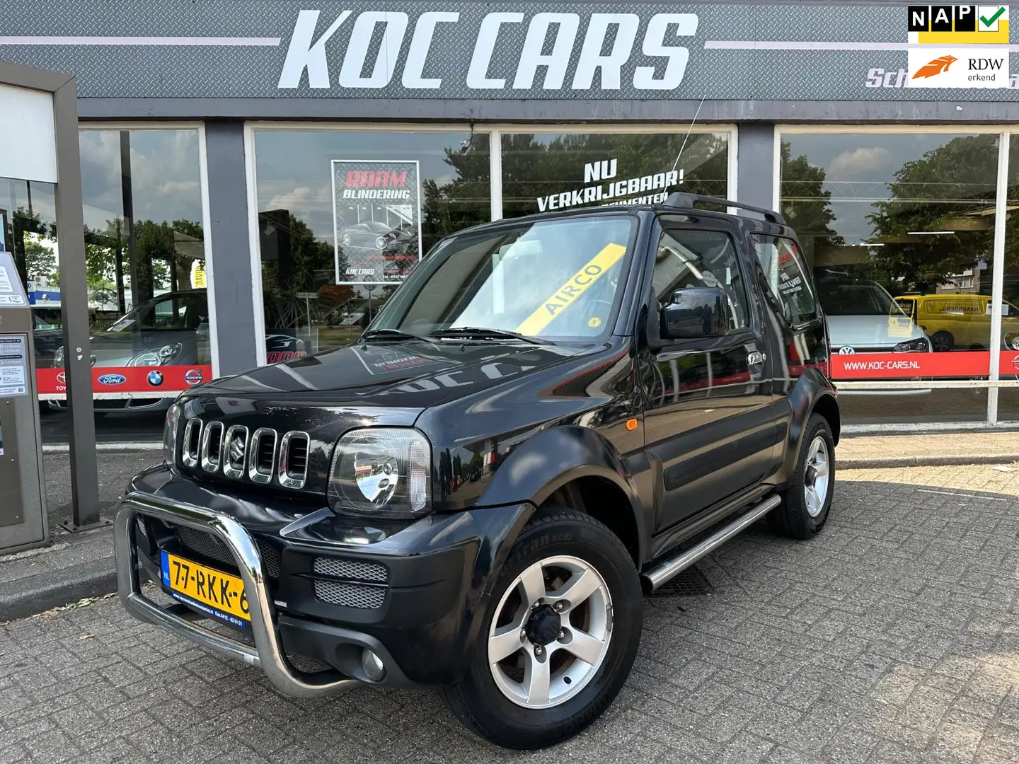 Suzuki Jimny 1.3 Exclusive 1ste EIGENAAR AIRCO 4X4 Zwart - 1