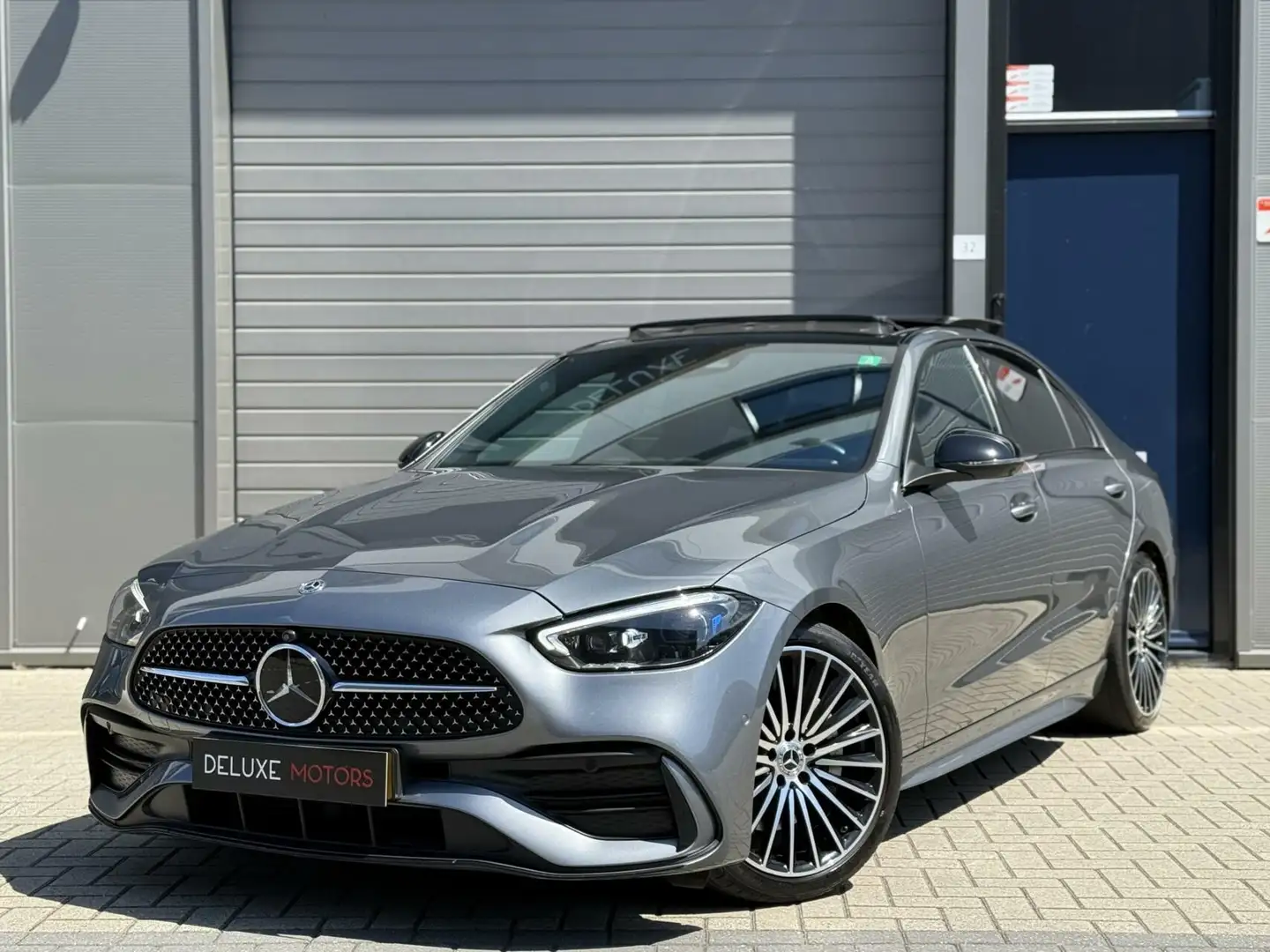 Mercedes-Benz C 300 AMG Burmester|Pano|360cam|Distronic Grijs - 1
