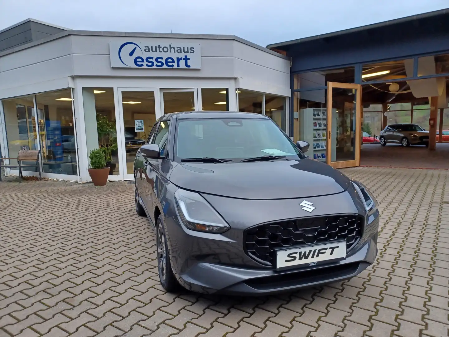 Suzuki Swift 1.2 Hybrid MT Comfort+Mit 5 Jahre Garantie Grijs - 2