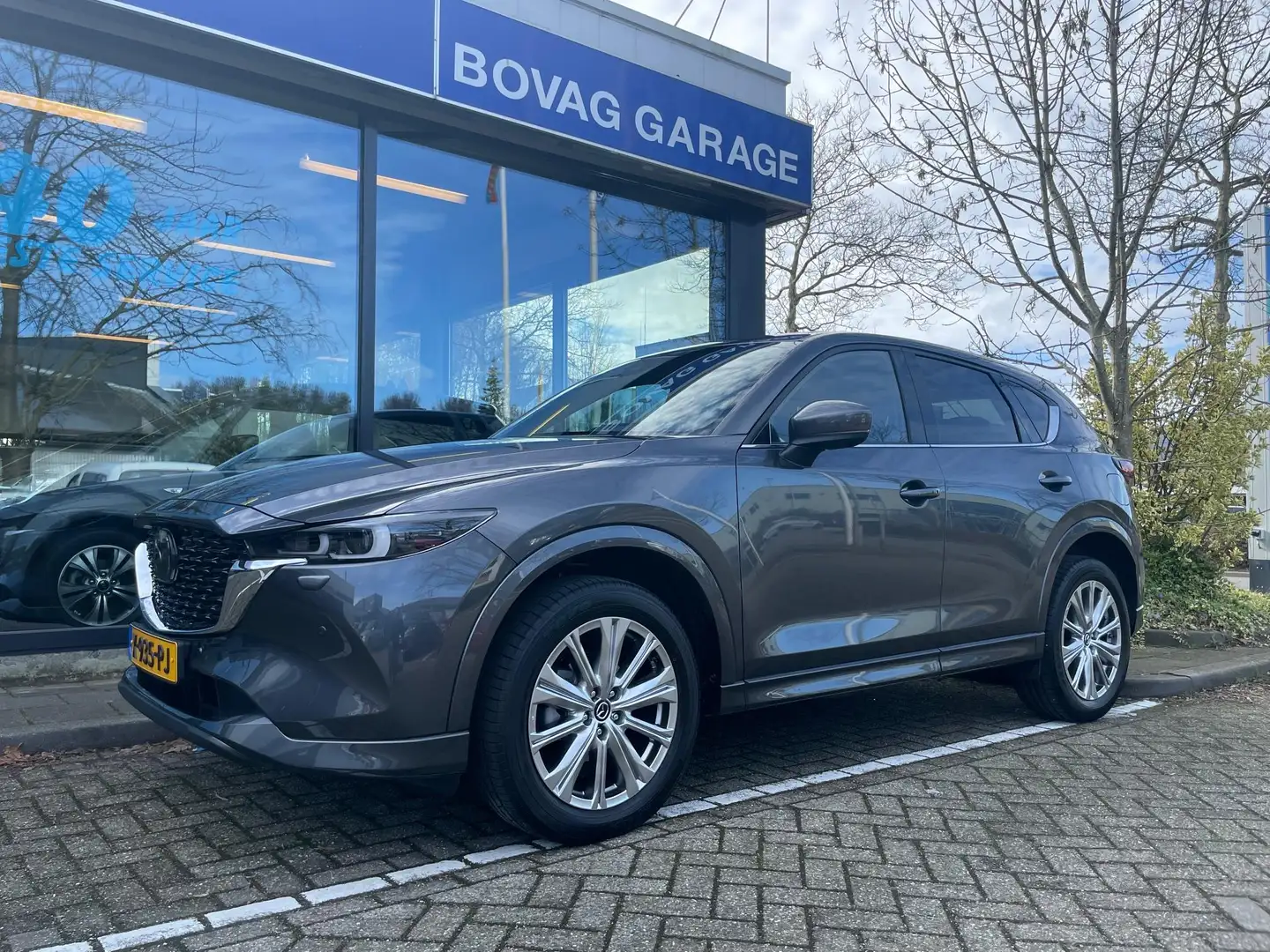 Mazda CX-5 2.0 e-SkyActiv-G M Hybrid 165 Takumi Grau - 1