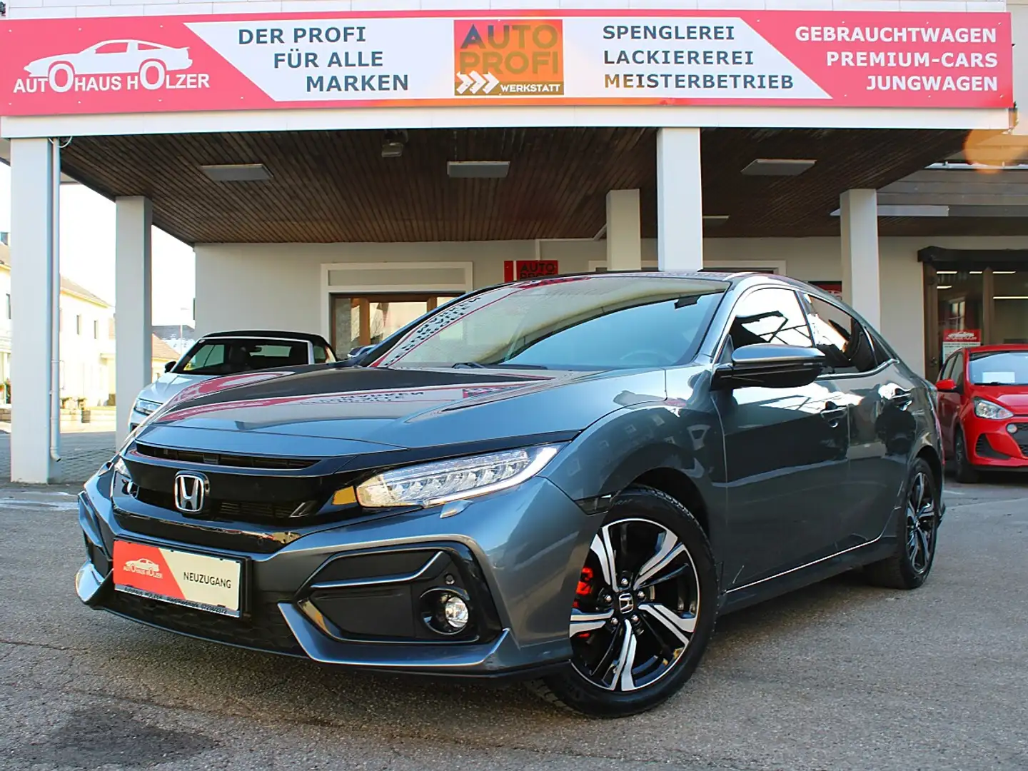Honda Civic 1,0 VTEC Turbo Elegance *AHK, NAVI, ACC* Grau - 1