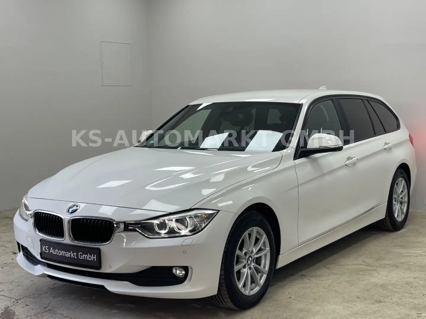 BMW 318 d Touring Aut*Sportsitz*Navi*Xenon*PDC*HeadUp Weiß - 1