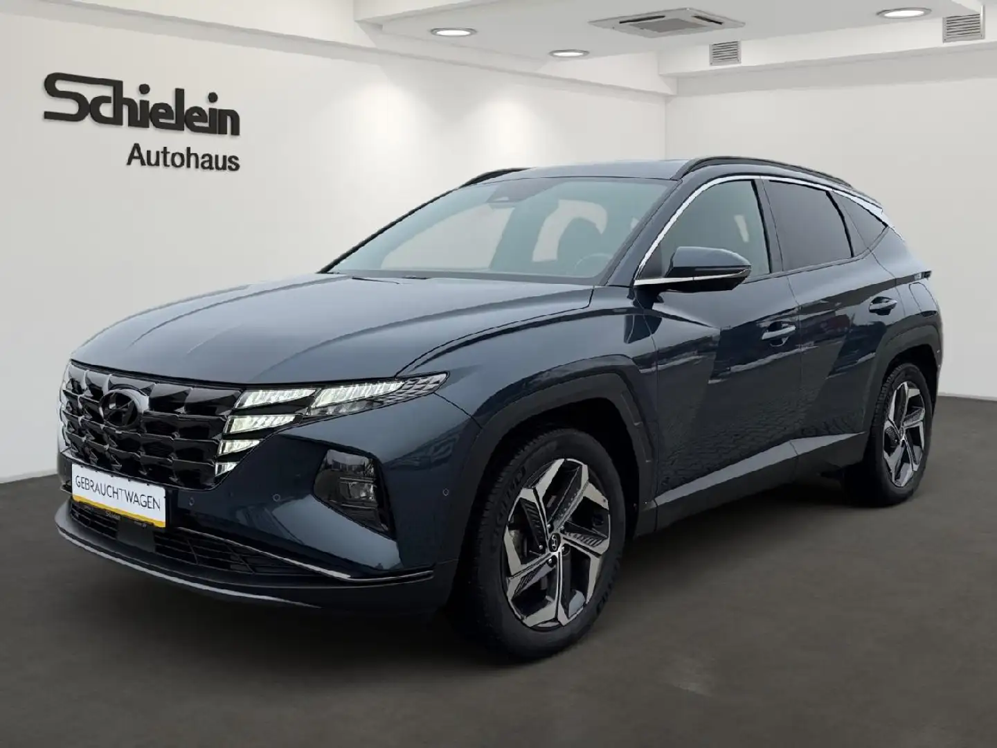 Hyundai TUCSON 1.6 Turbo 265PS PHEV 4WD Prime *AHK*8-fach* Blau - 1
