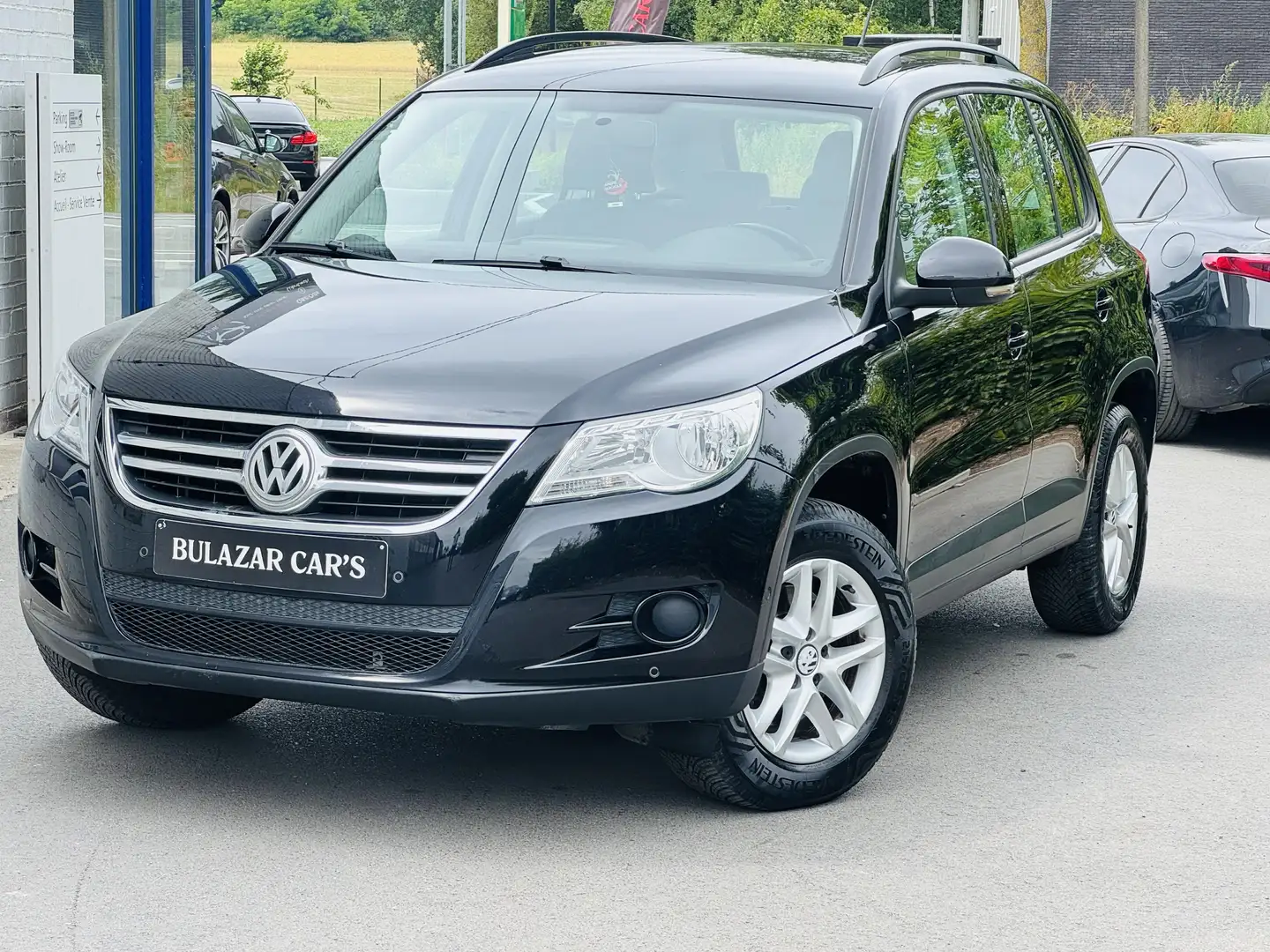 Volkswagen Tiguan 1.4 TSI CAR PLAY*1 ER MAIN*CARNET*PDC*GARANTIE Zwart - 1