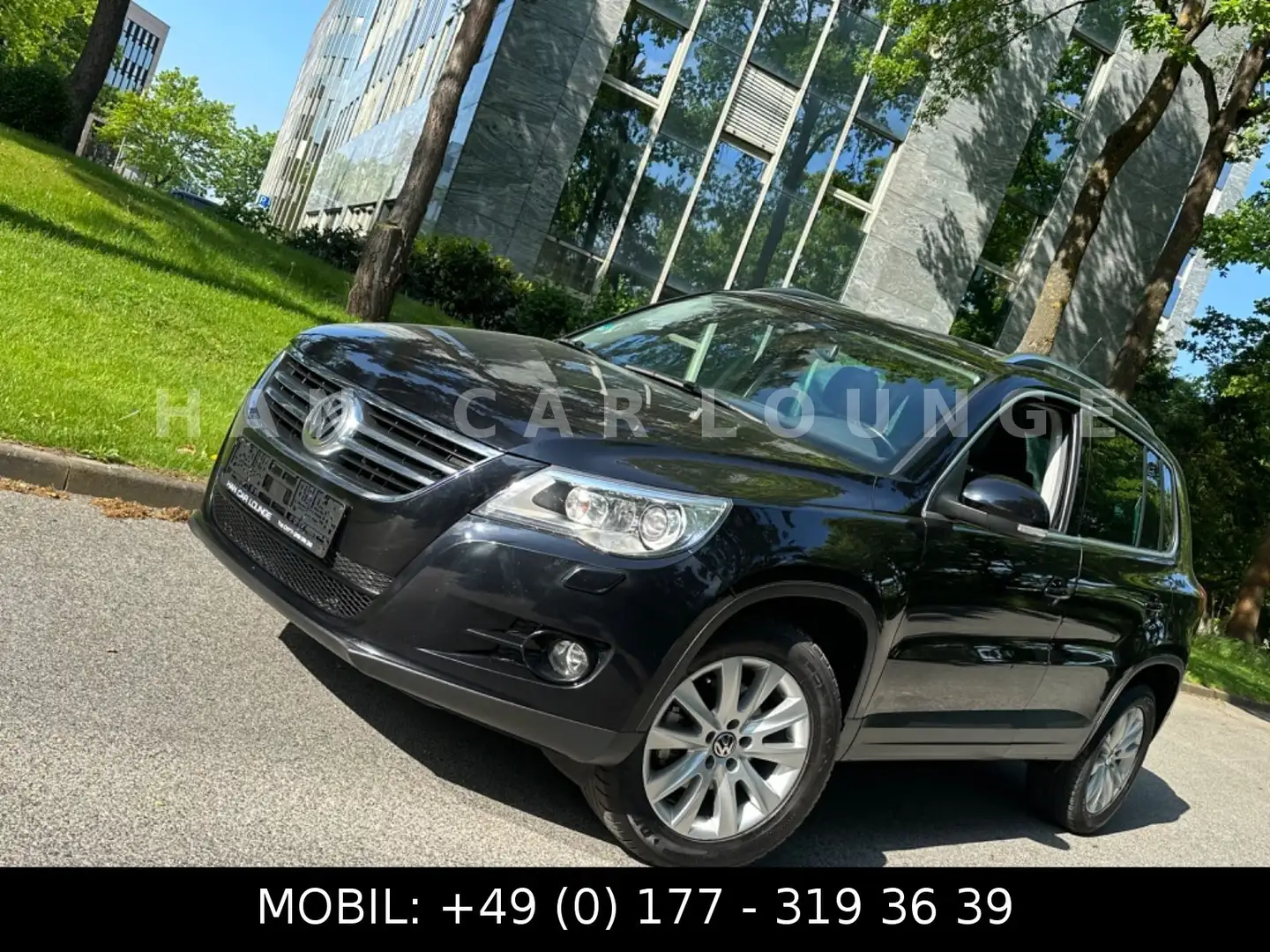 Volkswagen Tiguan 1.4 TSI Sport & Style BMT*1.HAND*NAVI*PDC Negro - 1