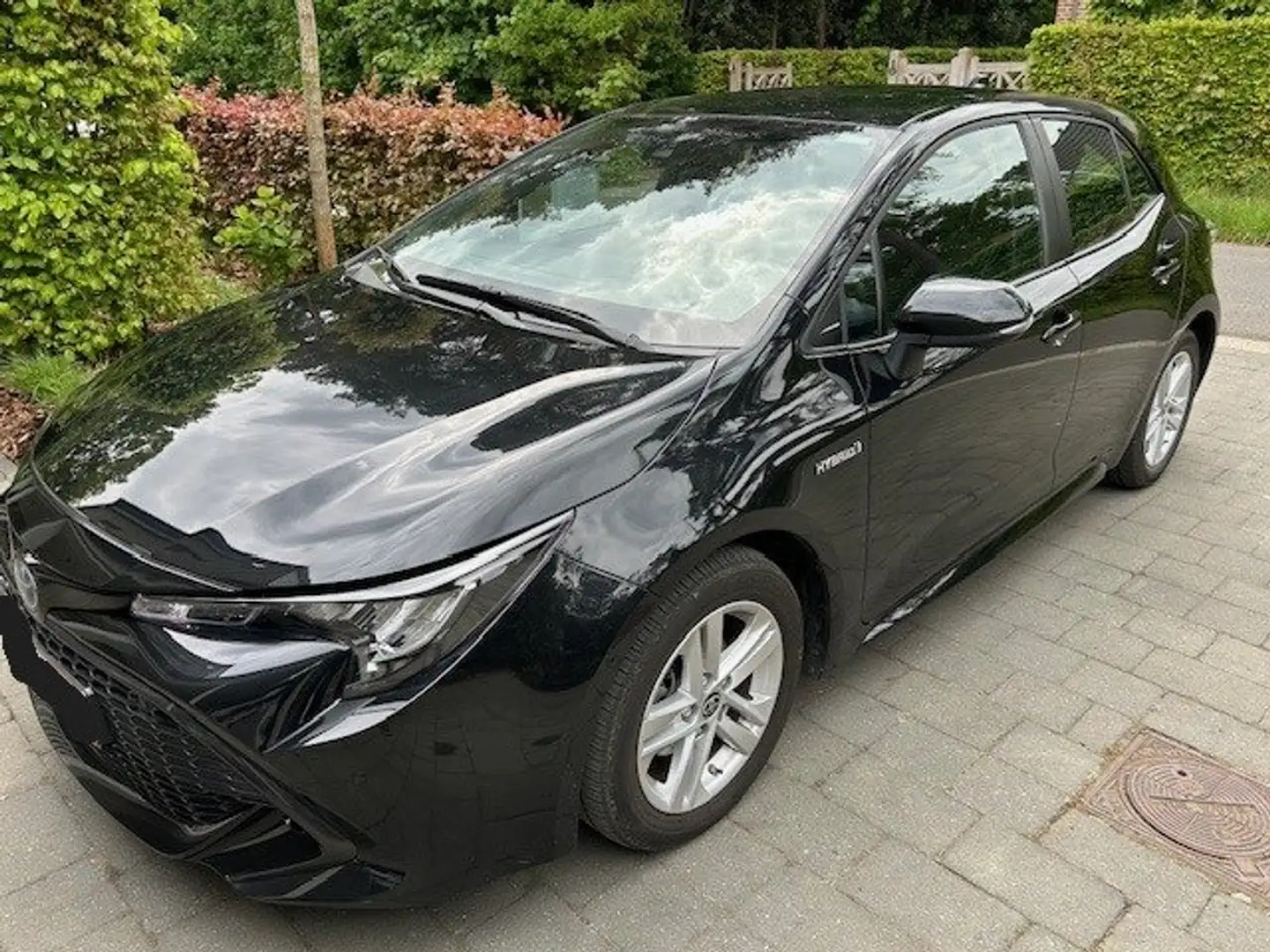 Toyota Corolla Corolla 1.8 Hybrid Zwart - 1