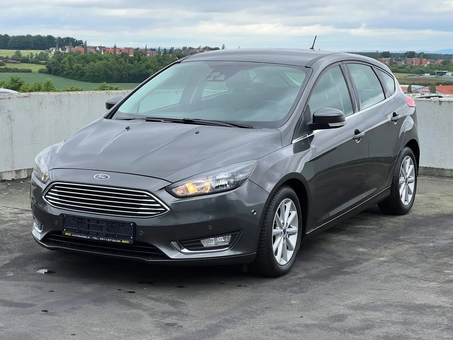Ford Focus 1.0 EcoBoost 125PS Titanium Alu 17“ PDC-H/V Grijs - 2