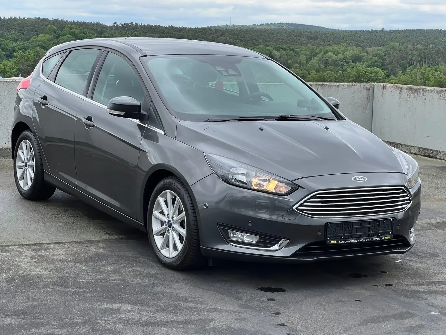 Ford Focus 1.0 EcoBoost 125PS Titanium Alu 17“ PDC-H/V Grijs - 1
