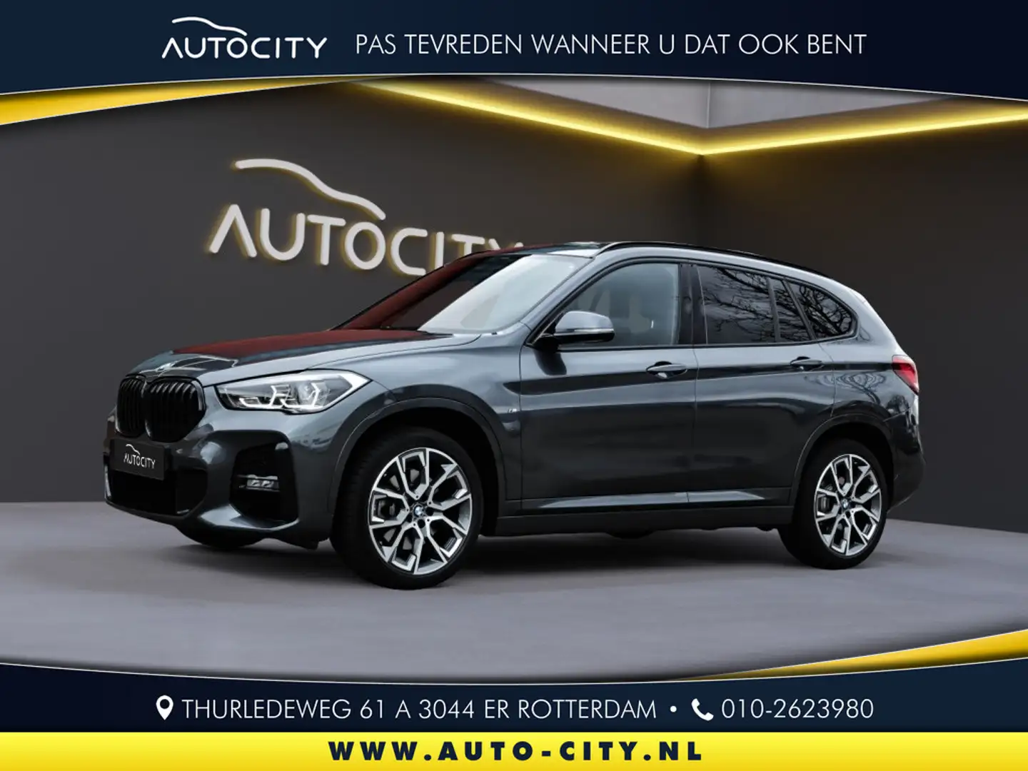 BMW X1 sDrive 20i M Sport Pano l Memory l Trekhaak l VOL Gris - 1