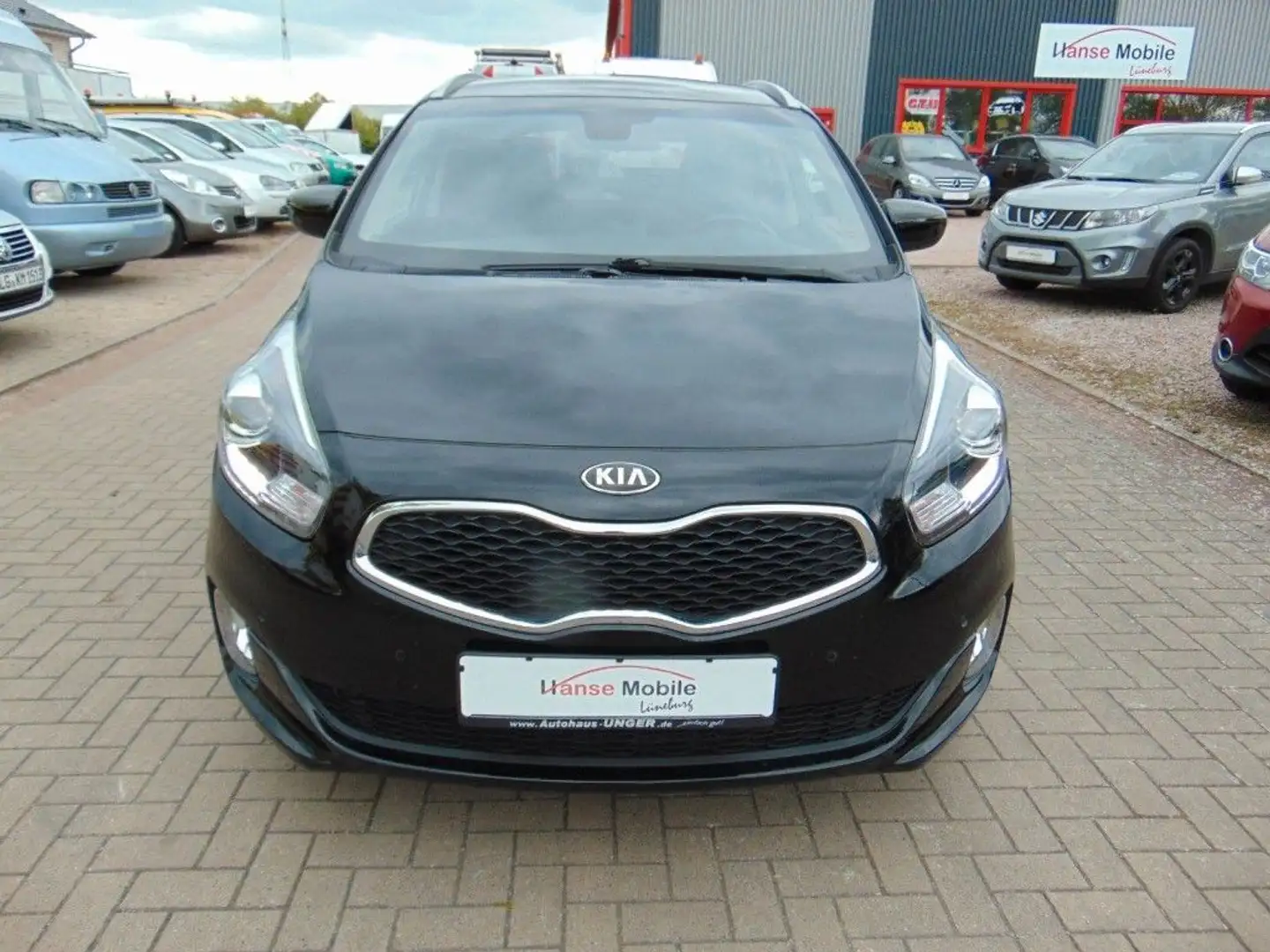 Kia Carens Vision Zwart - 1