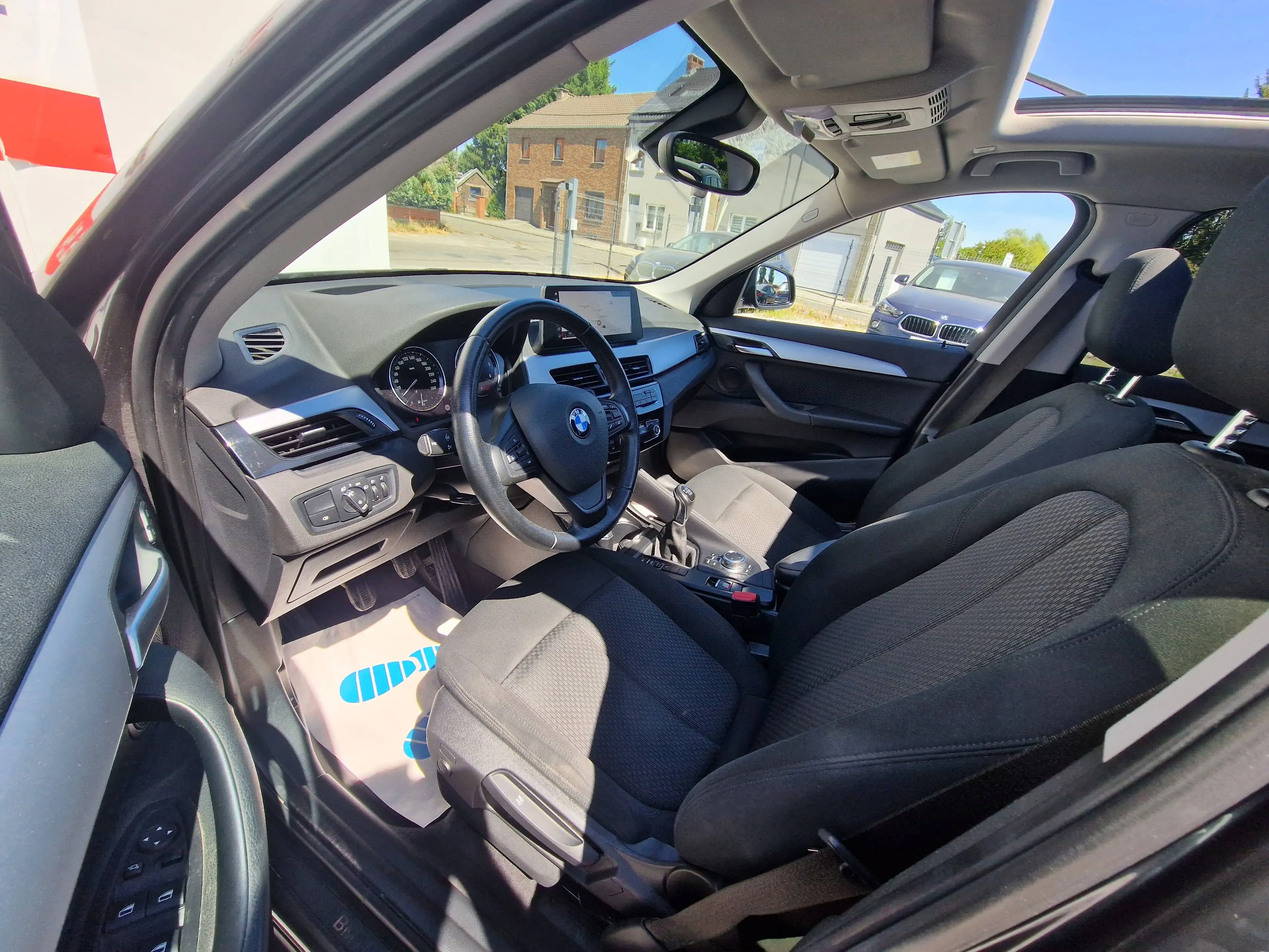 BMW X1 1.5 d sDrive16*1°PROPRIO*CARNET*GPS*TOIT OUVRANT*CAMERA*PDC — photo 5