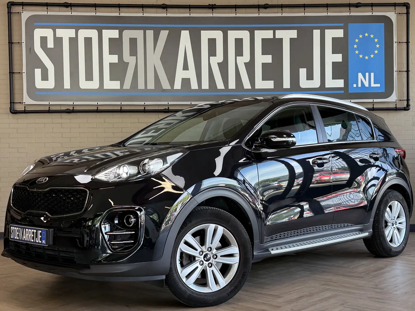 Kia Sportage 1.6 GDI ExecutiveLine Navi | JBL | Leder | Blindsp Zwart - 1
