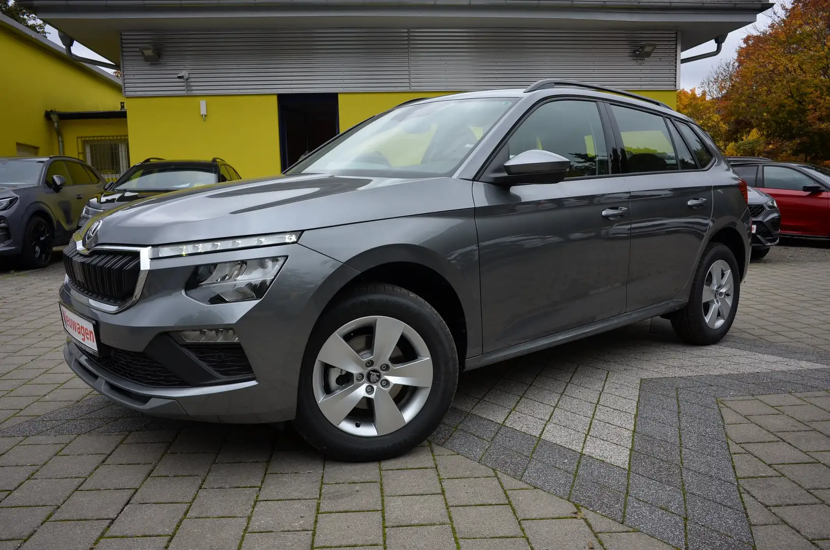 Skoda Kamiq 1.0 TSI DSG Selection 5JGAR+AHK+KAMERA+SHZ Grau - 1