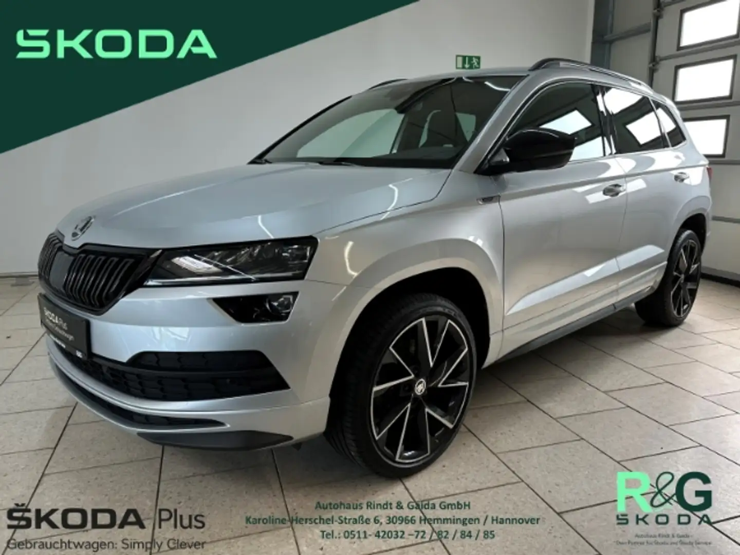 Skoda Karoq Sportline 1.5 TSI ACT DSG Navi ACC SHZ LED Silber - 1