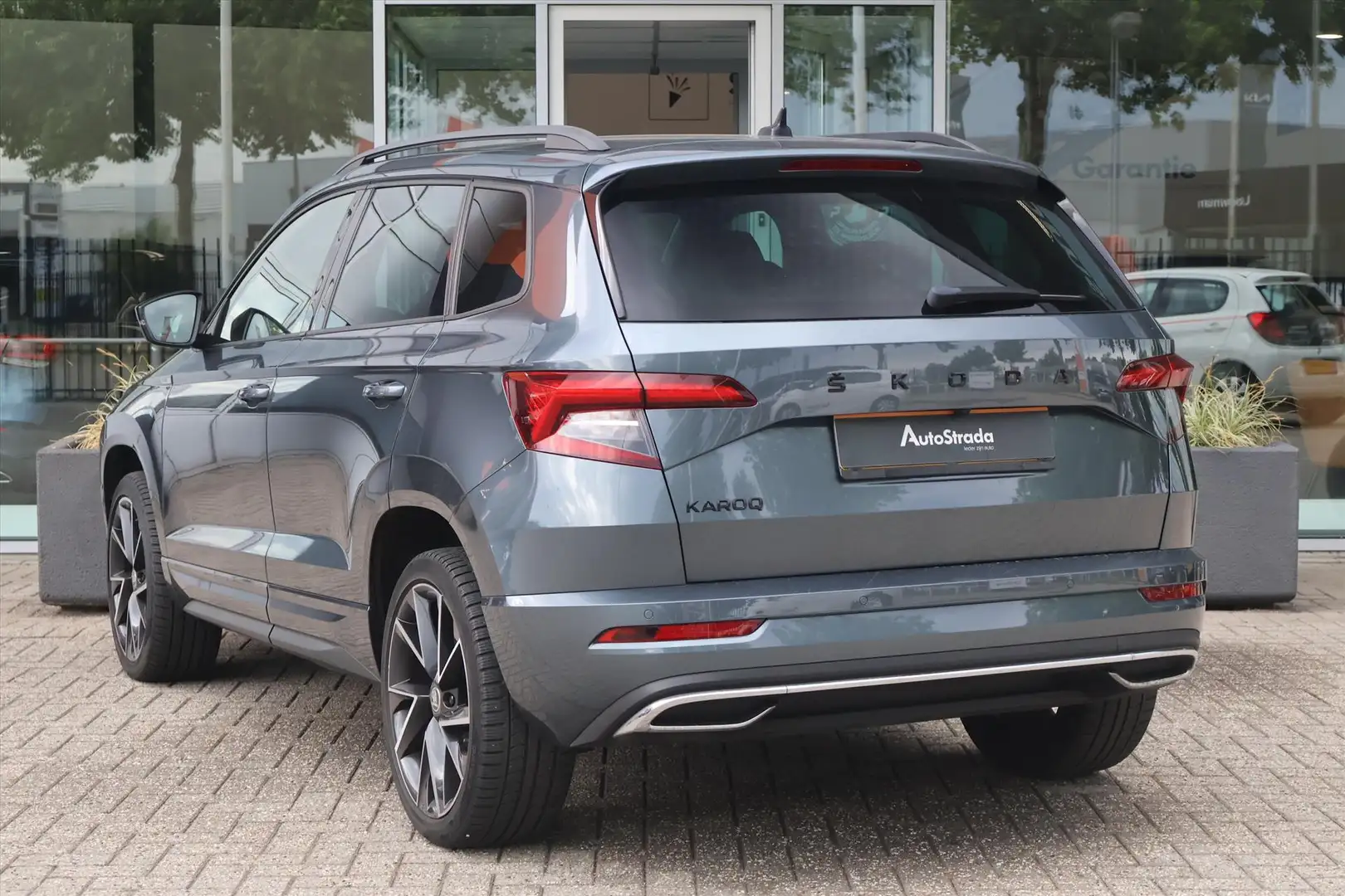Skoda Karoq 1.5 SportLine TSI ACT 150pk | Leder | Adaptive | C Gris - 2