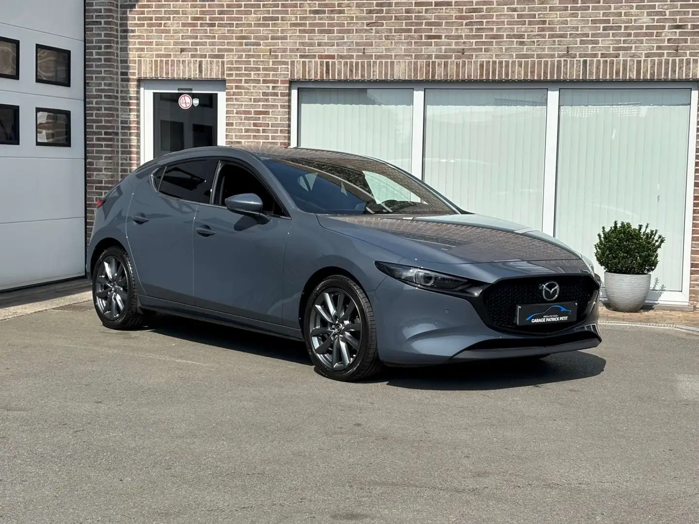 Mazda 3 2.0 M-HYBRID / Camera / 45000km / 12m waarborg Grijs - 1