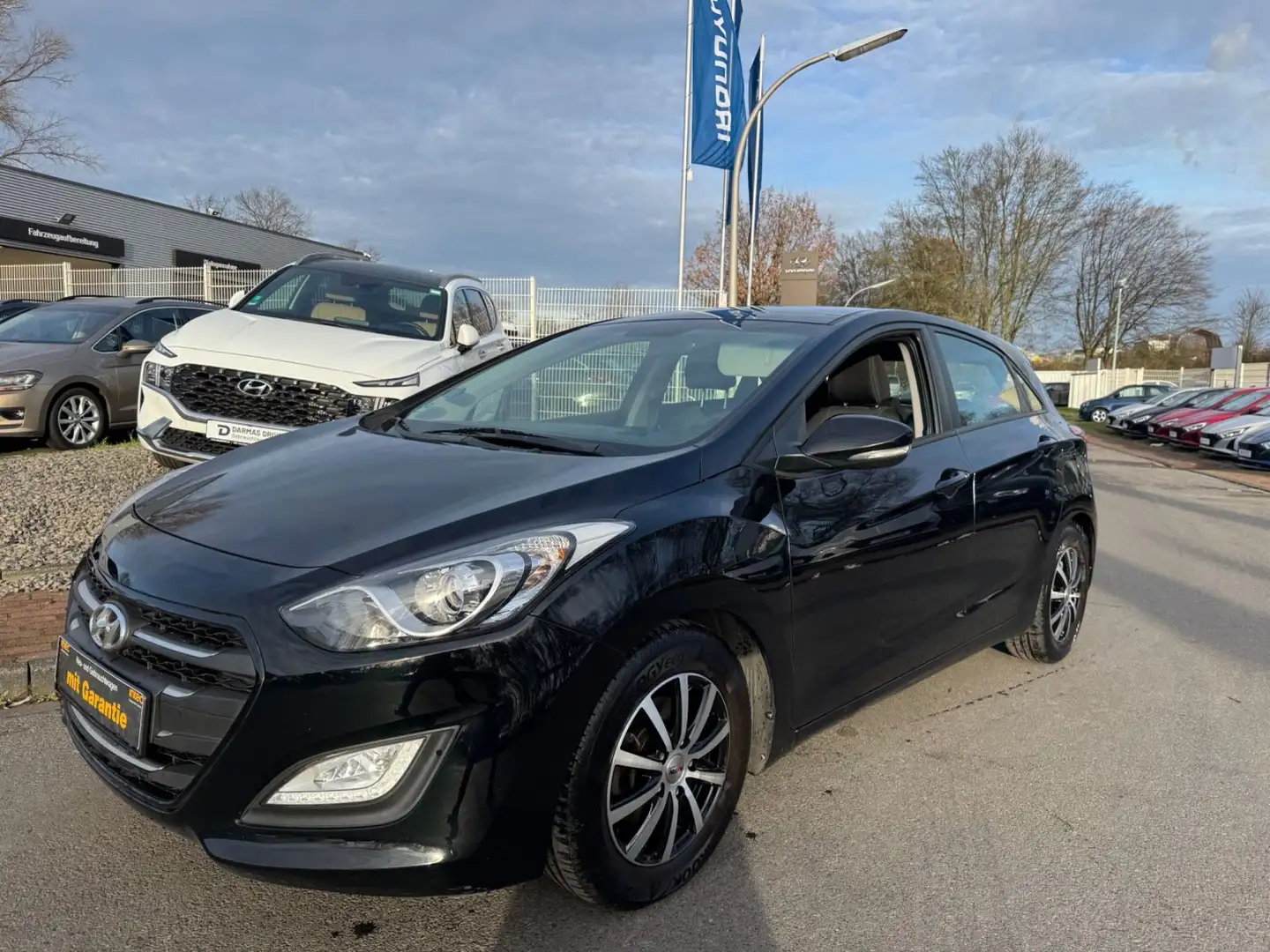 Hyundai i30 2.HD/KLIMA/NAVI/R.KAM/PDC/ALU/TÜV-SERV.-NEU Schwarz - 1