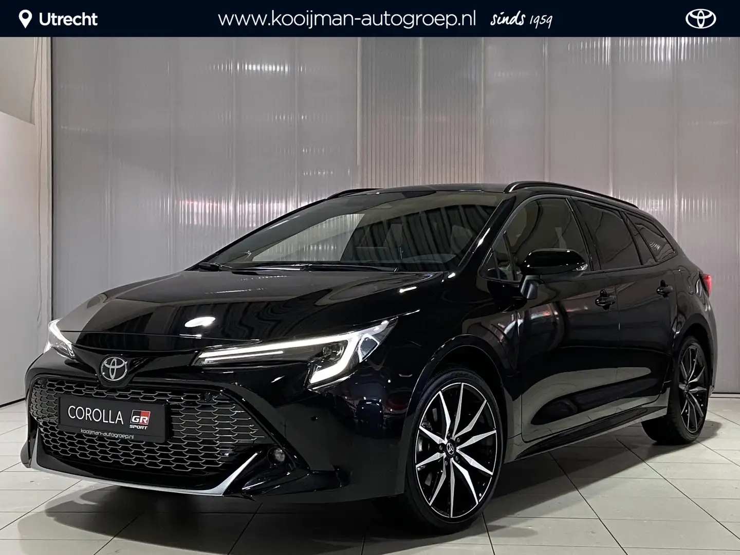 Toyota Corolla Touring Sports 2.0 Hybrid GR Sport Plus 196PK Toyo Zwart - 1