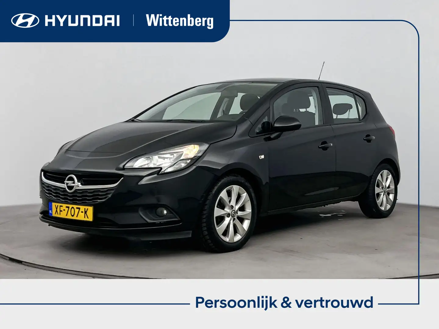 Opel Corsa 1.4 Favourite | Lm-wielen | Airco | Bluetooth | Zwart - 1