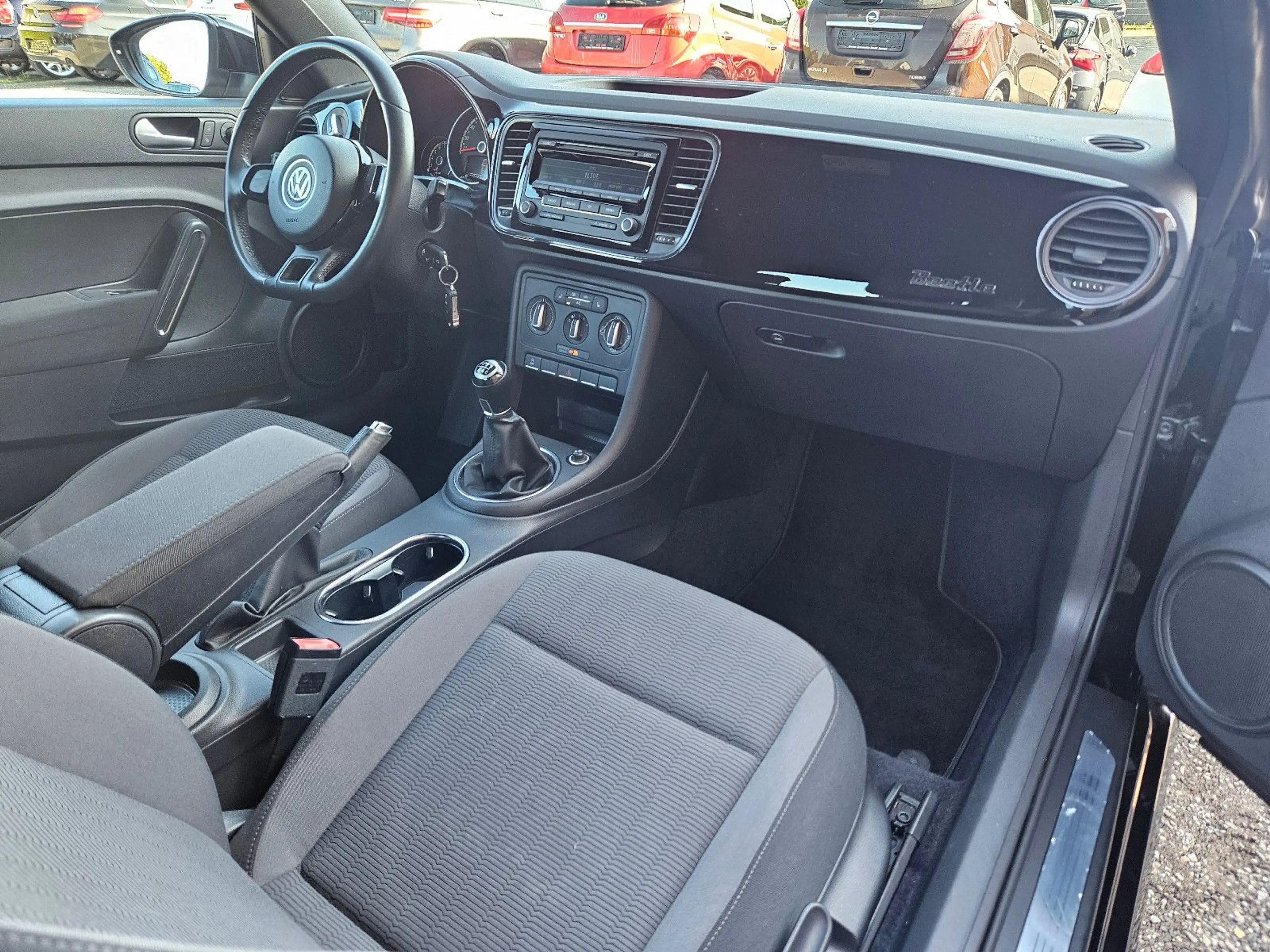 Volkswagen Beetle 1.2 Cabriolet BMT — photo 14