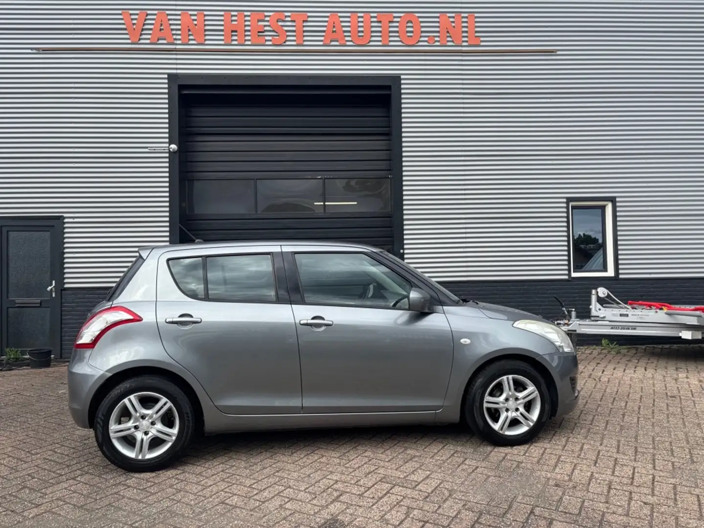 Suzuki Swift 1.2 Comfort | 3 MND GAR | AIRCO | SPORTVELGEN | EL Gris - 2