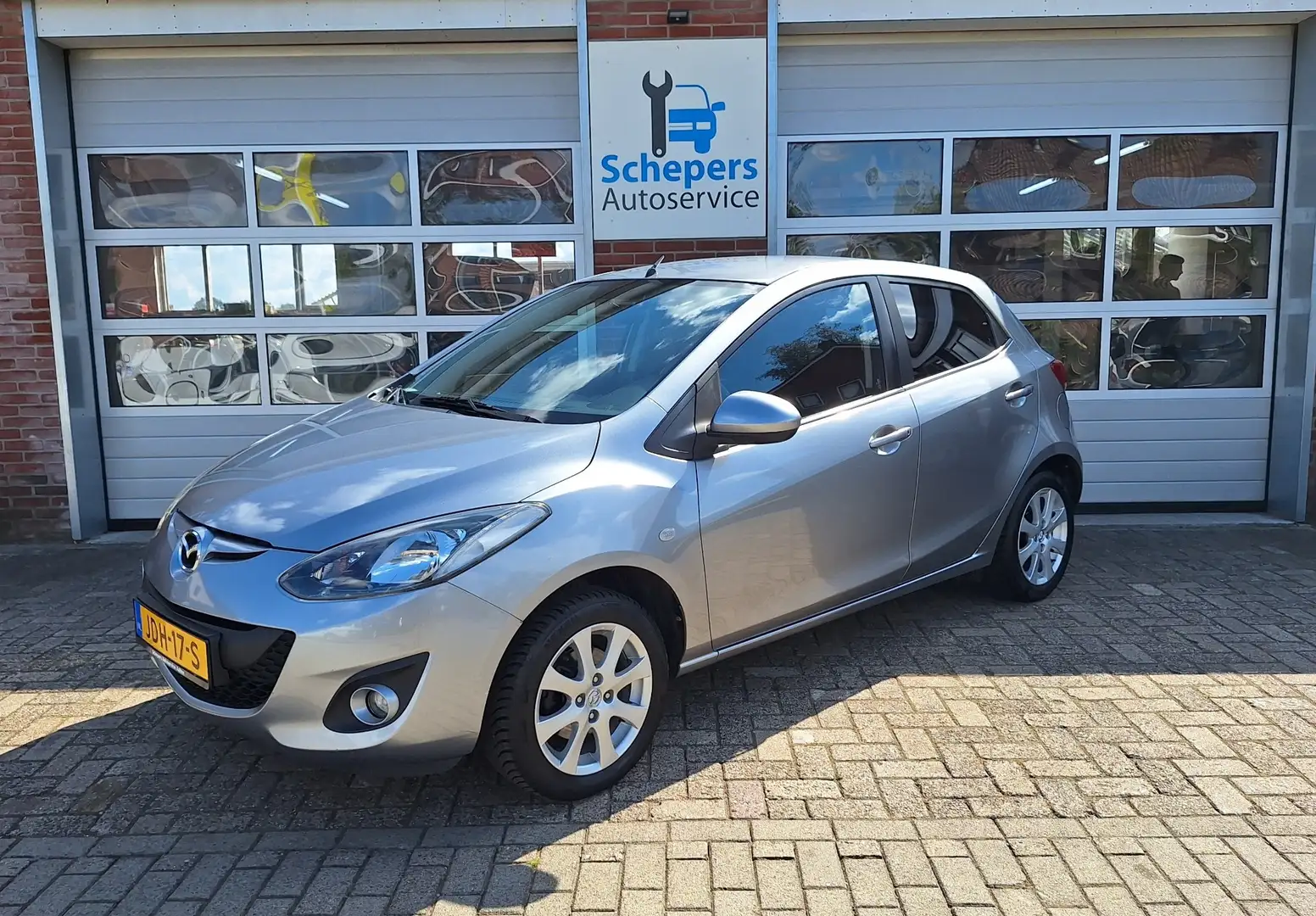 Mazda 2 1.3 TS- Airco | Stoelverwarming | Allseason Banden Argent - 1