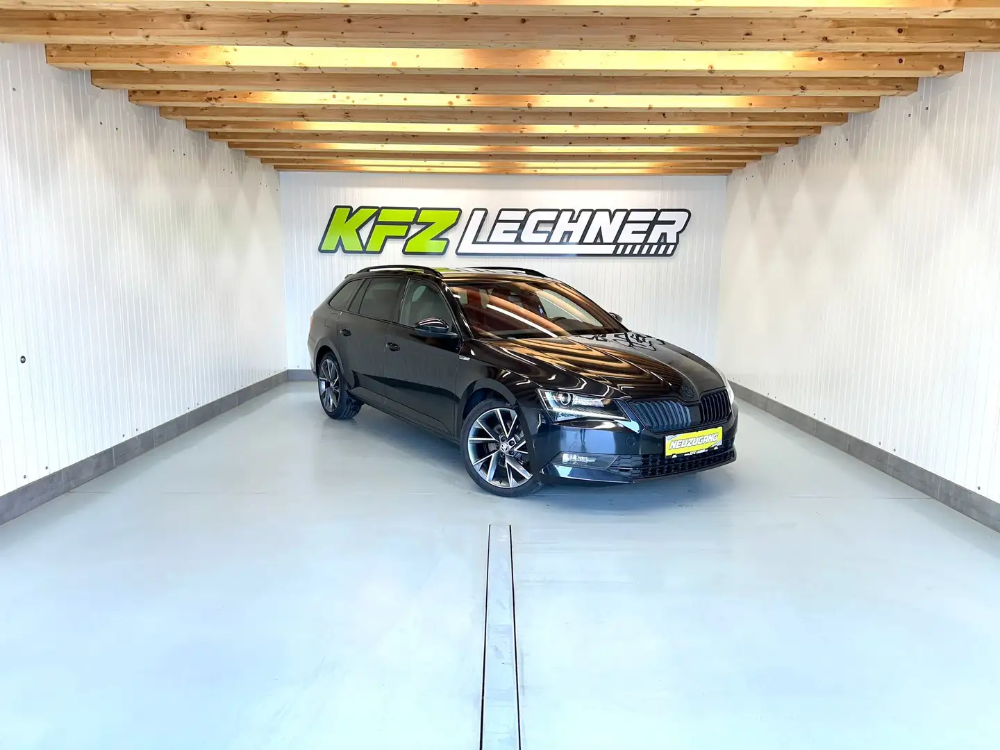 Skoda Superb Combi 2.0 TDI DSG "Sportline" AHK*SITZH*NAVI Schwarz - 1