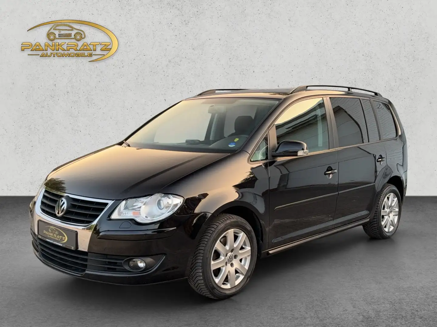 Volkswagen Touran 1.4TSI Trendline *7 Sitzer *Xenon *SHZ *PDC *AHK Schwarz - 1