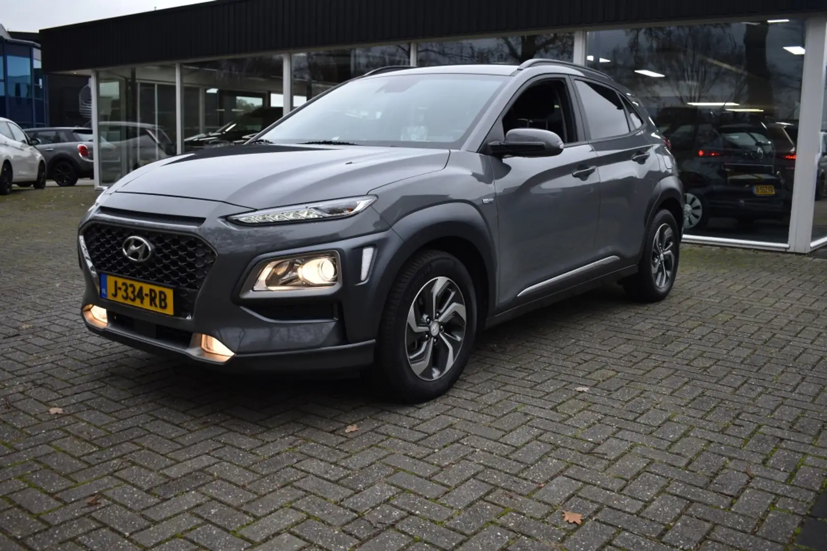 Hyundai KONA 1.6 GDI HEV Fashion NAVI CAMERA CARPLAY PDC CLIMA Grijs - 1