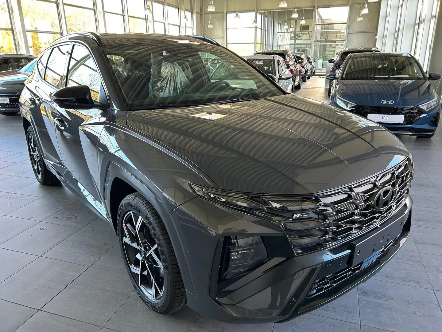 Hyundai TUCSON FL 1.6 7-DCT N-LineX Assistenz-P.MatrixLED Grau - 1