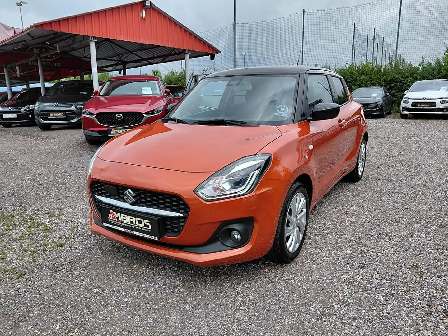 Suzuki Swift 1,2 Hybrid DualJet Shine Orange - 1