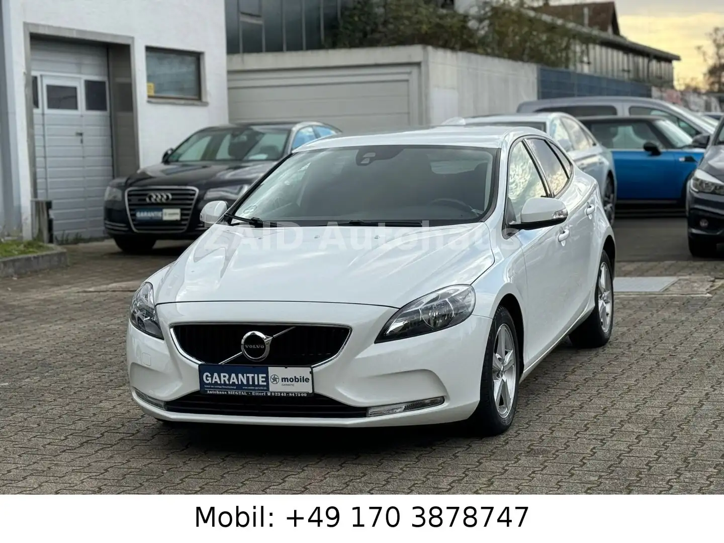 Volvo V40 Kinetic 2.0L*AUTOMATIK*NAVI*PDC*1HAND* Weiß - 1