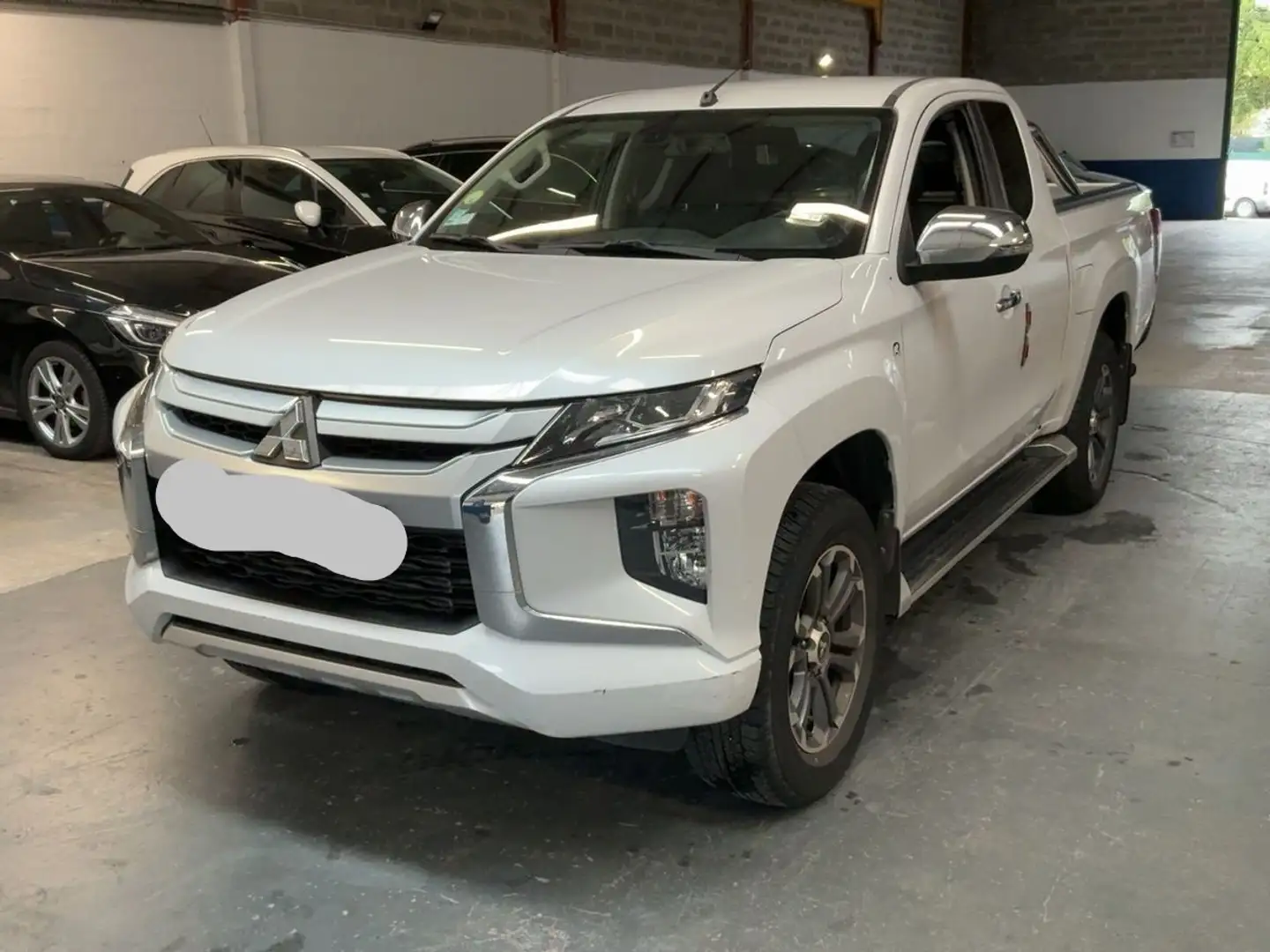 Mitsubishi L200 L200 d.cab 2.3d Intense Pack 1 Intouch 4wd 150cv Bianco - 1