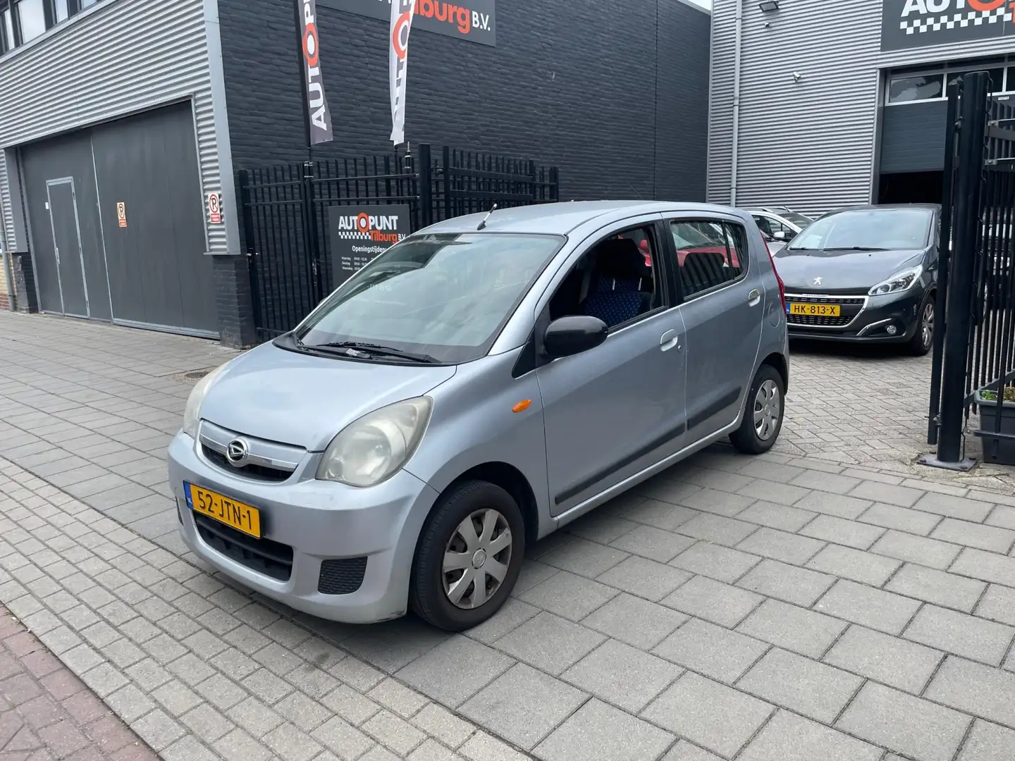 Daihatsu Cuore 1.0 Class 3e Eigenaar! Airco NAP APK Grijs - 1