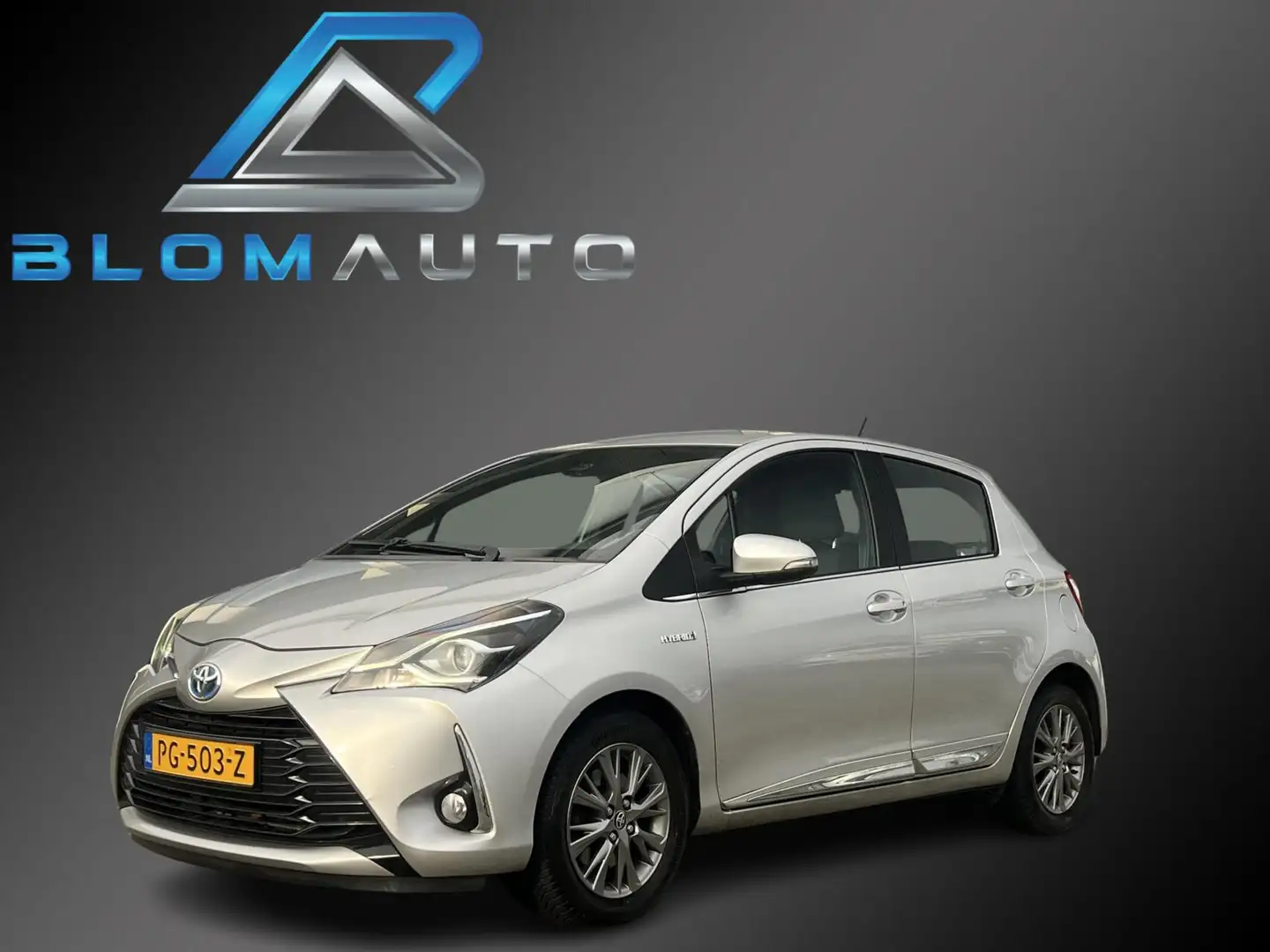 Toyota Yaris 1.5 Hybrid Executive 101PK NAVI+CAMERA NL AUTO Grau - 1
