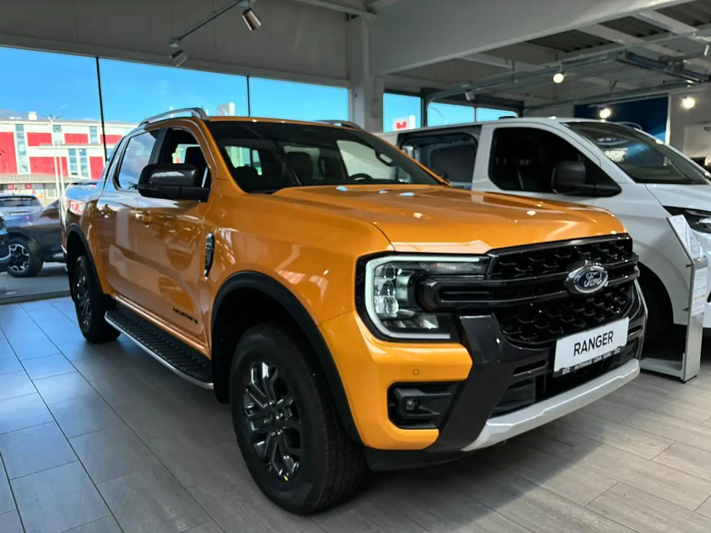 Ford Ranger Ranger Doppelkabine Wildtrak 3,2t netto € 50.17... Orange - 1