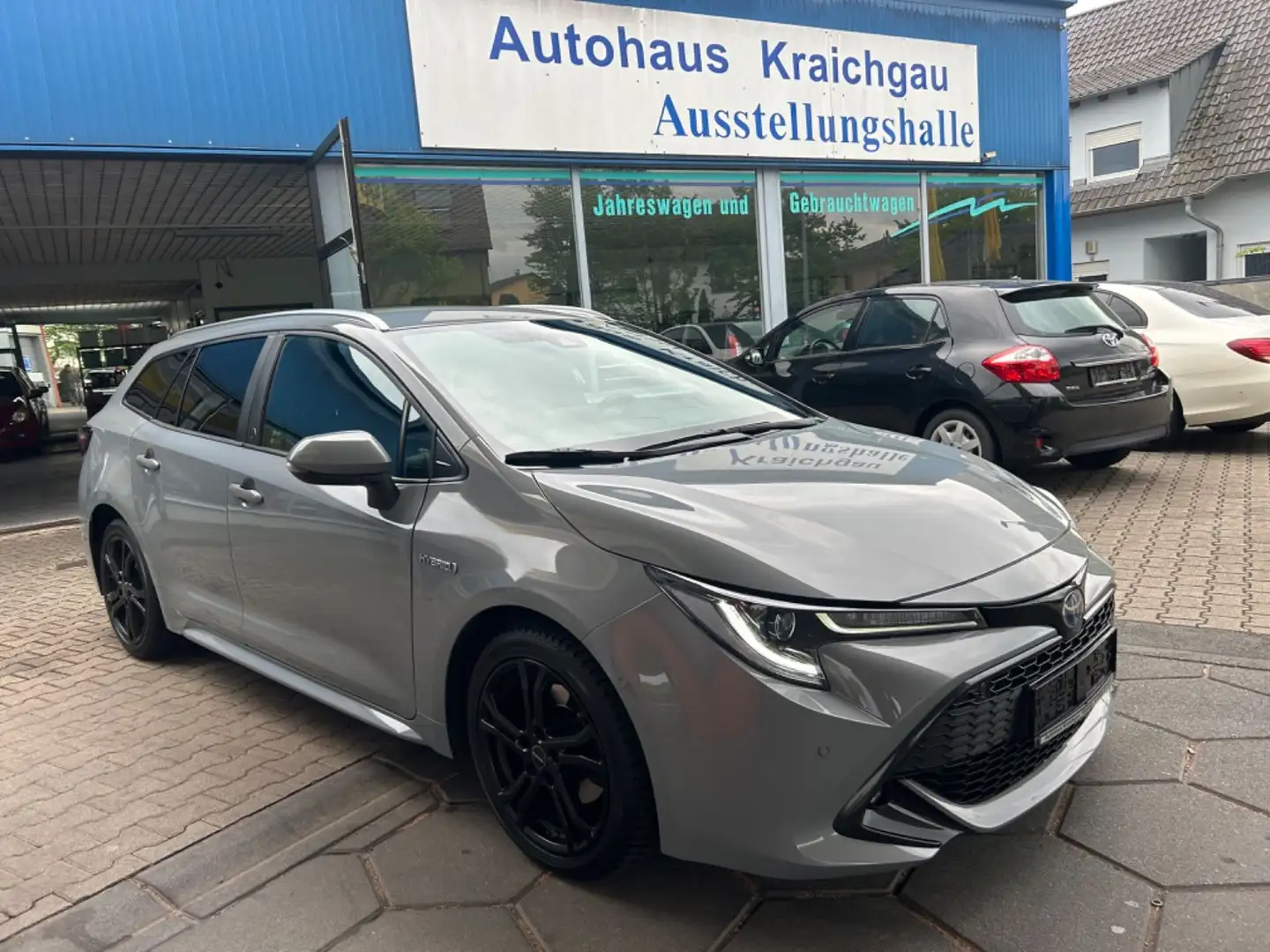 Toyota Corolla Touring Sports Hybrid Team D 2.0 Bi-Led Grau - 1